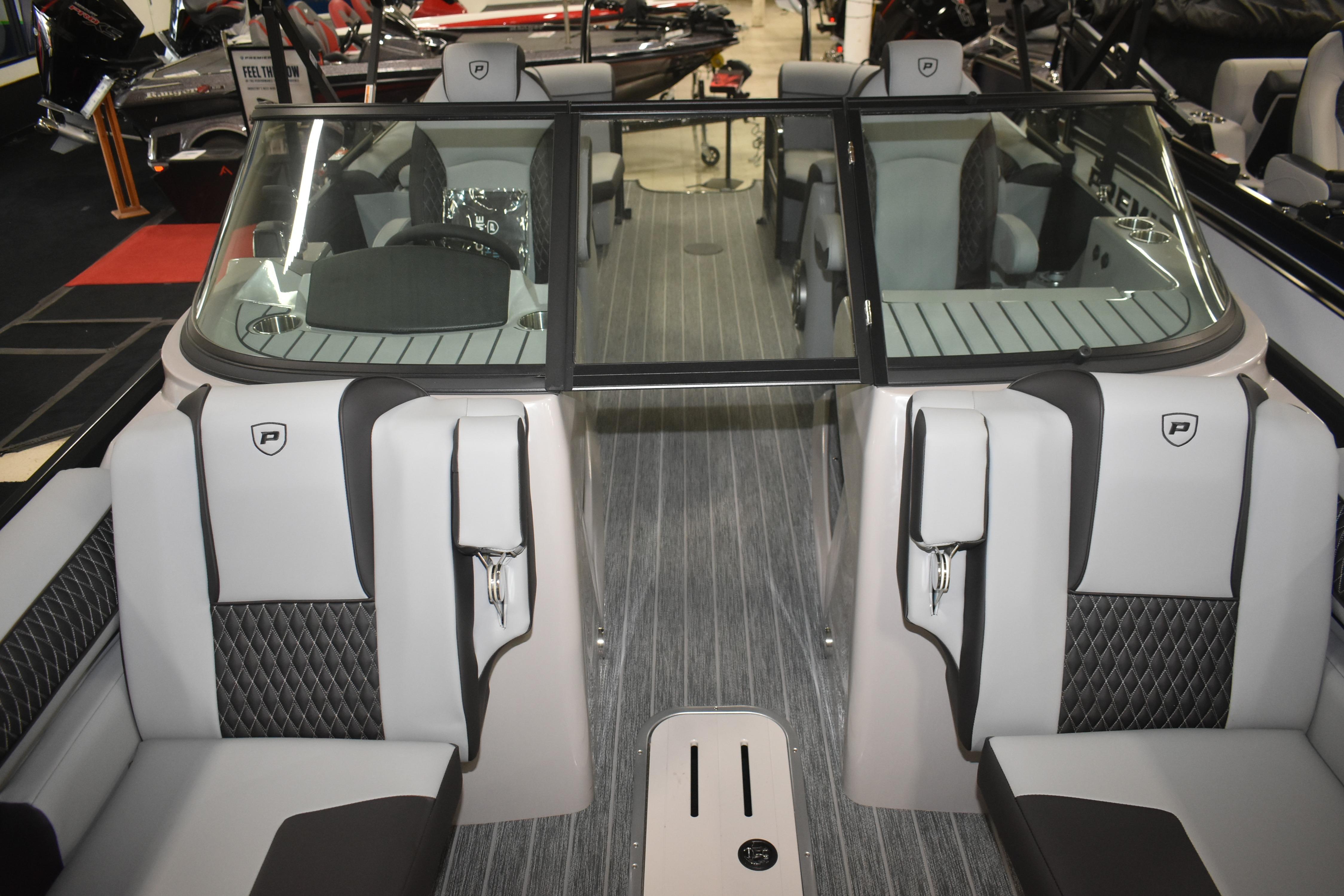 Interior view of 2026 Premier 250 Solaris Sport boat, featuring sleek seating and modern design.