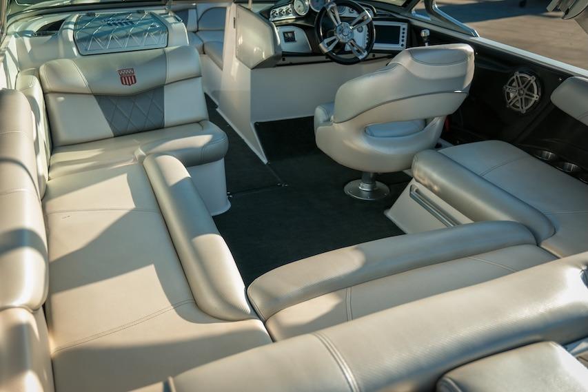 2013 MasterCraft X-2 boat interior with luxurious seating and modern dashboard.