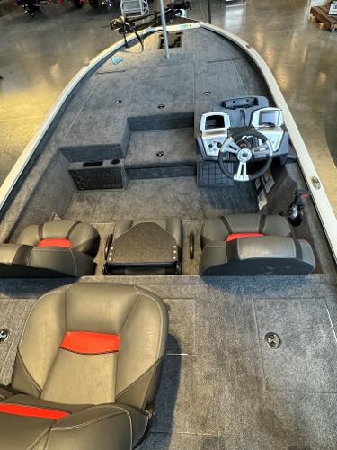 2025 Tracker Savage 215 boat interior with steering console and seating.