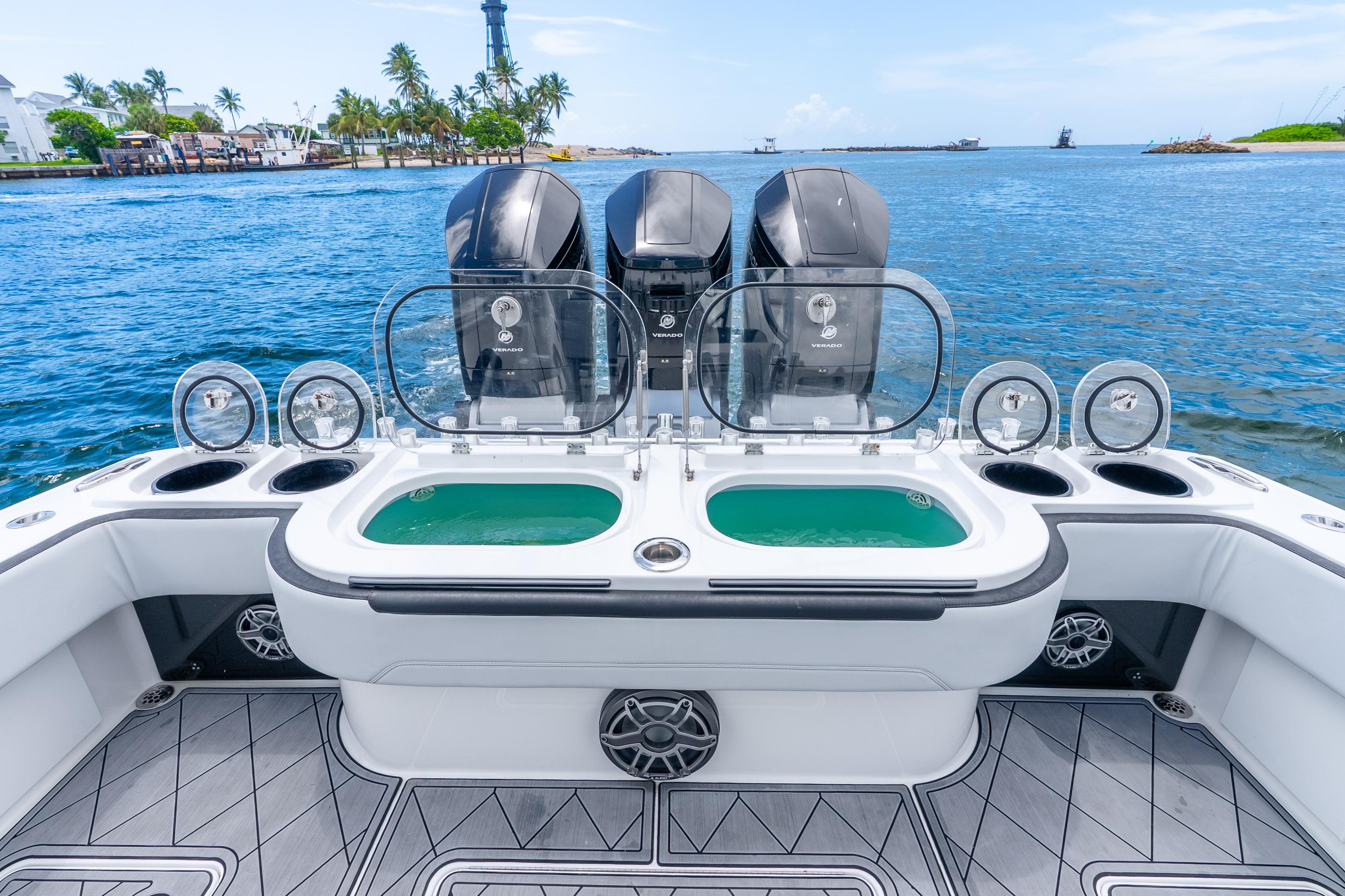 2024 Nor-Tech 452 Super Fish boat with triple engines and fishing amenities on open water.