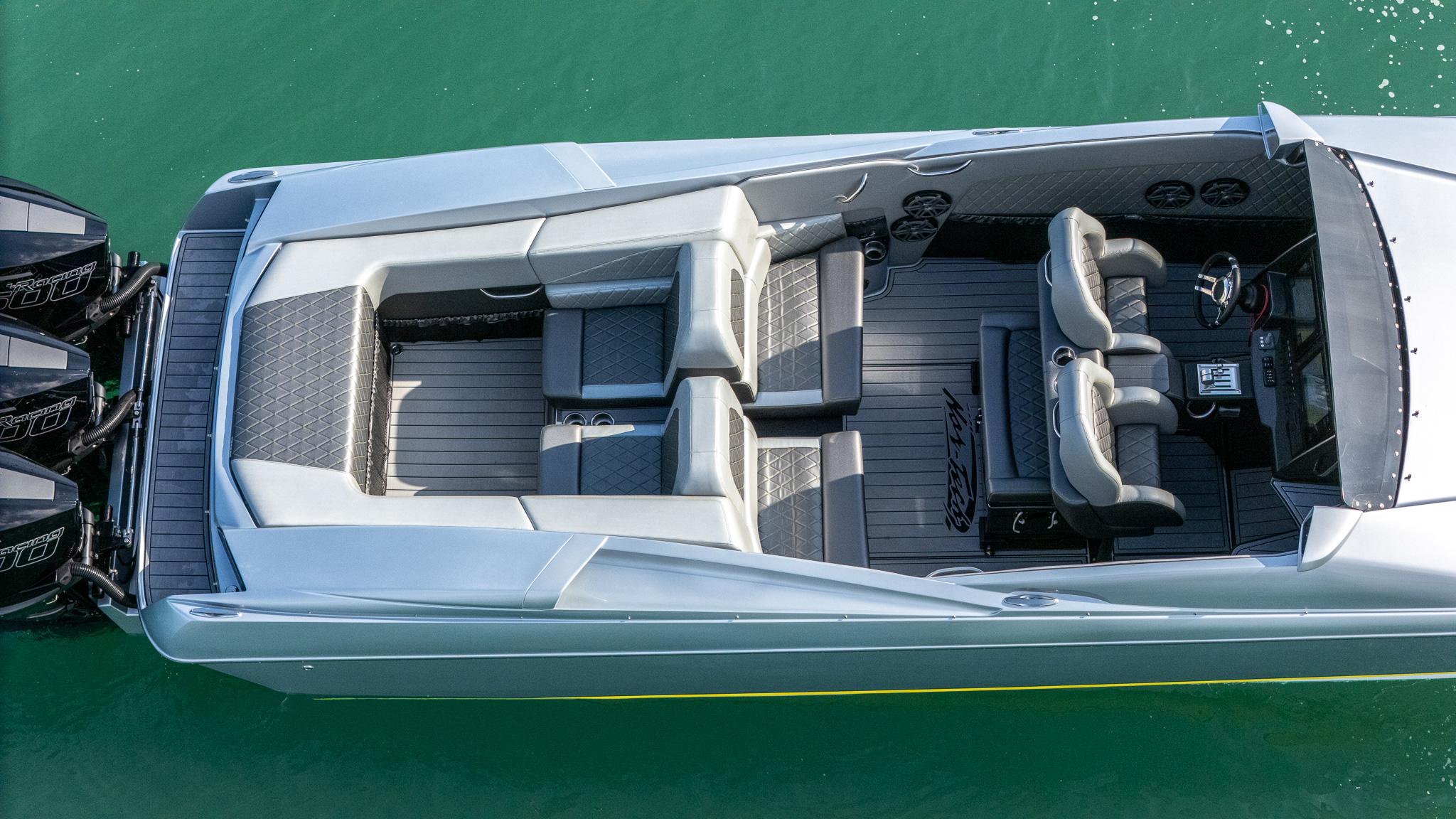 2017 Nor-Tech 3900 Super-VEE boat, aerial view, sleek design, spacious seating, triple engines.
