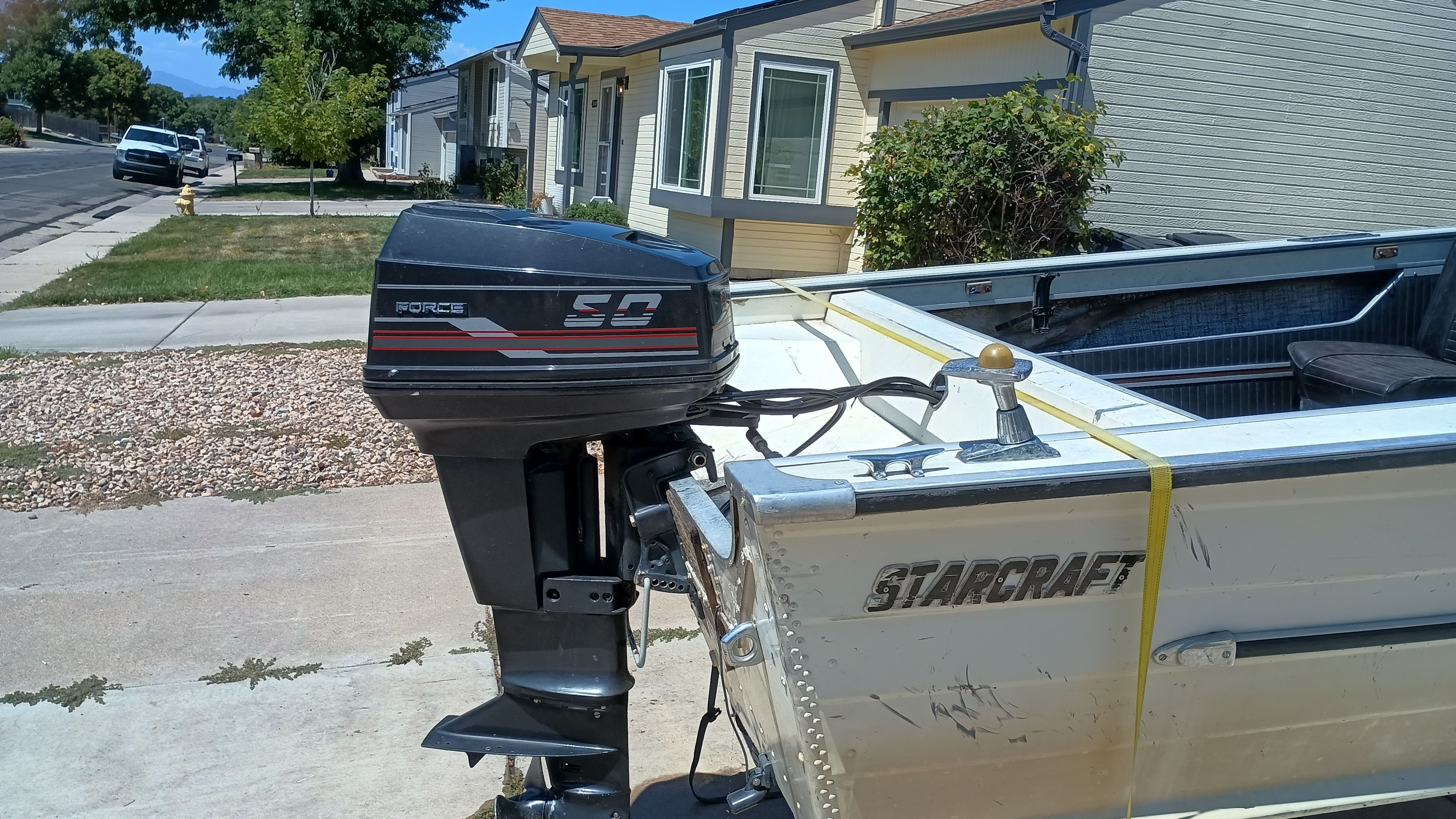 1970 Starcraft Jupiter V boat with outboard motor.