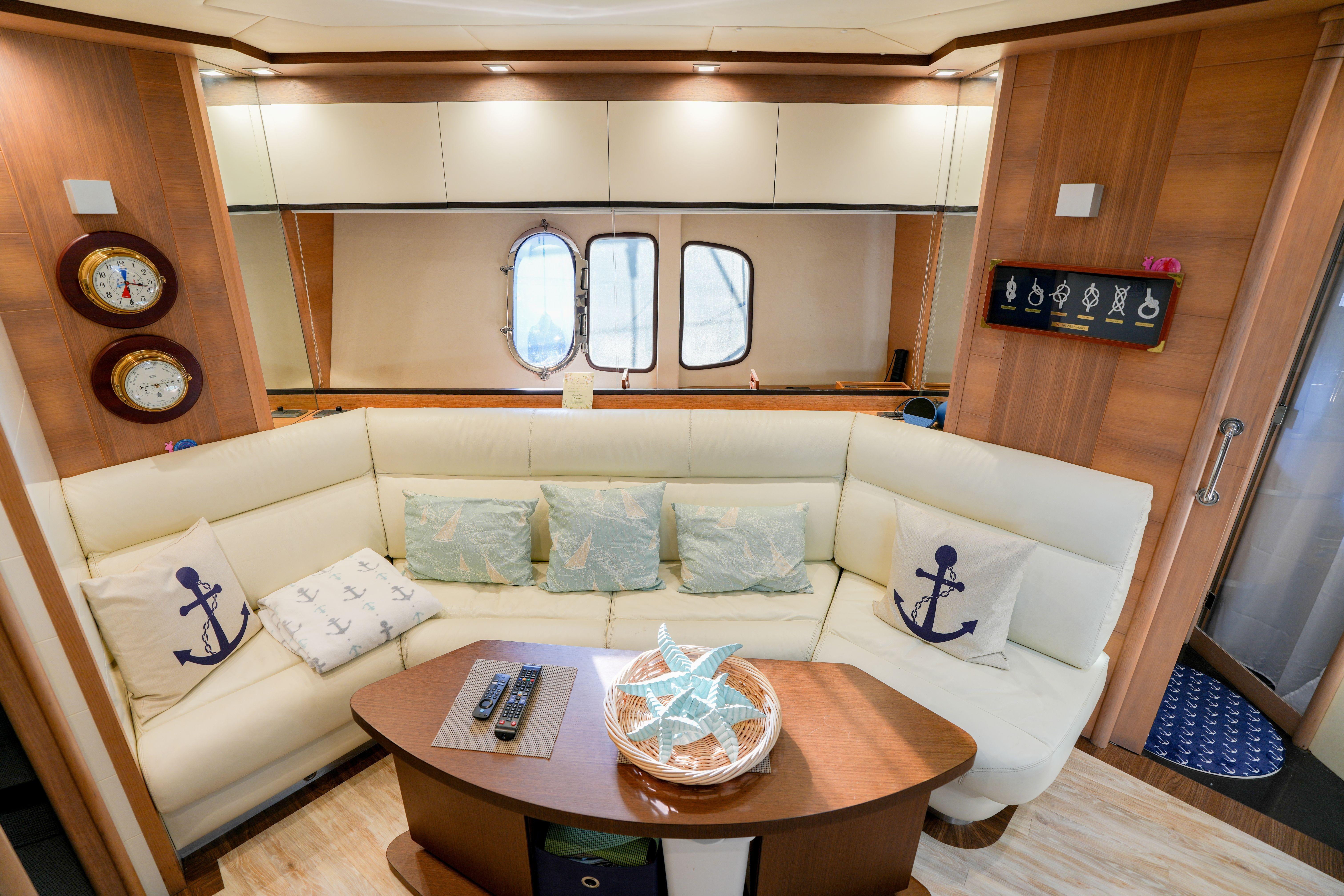Luxurious interior of 2007 Astondoa 53 Open Cruiser with nautical-themed decor.