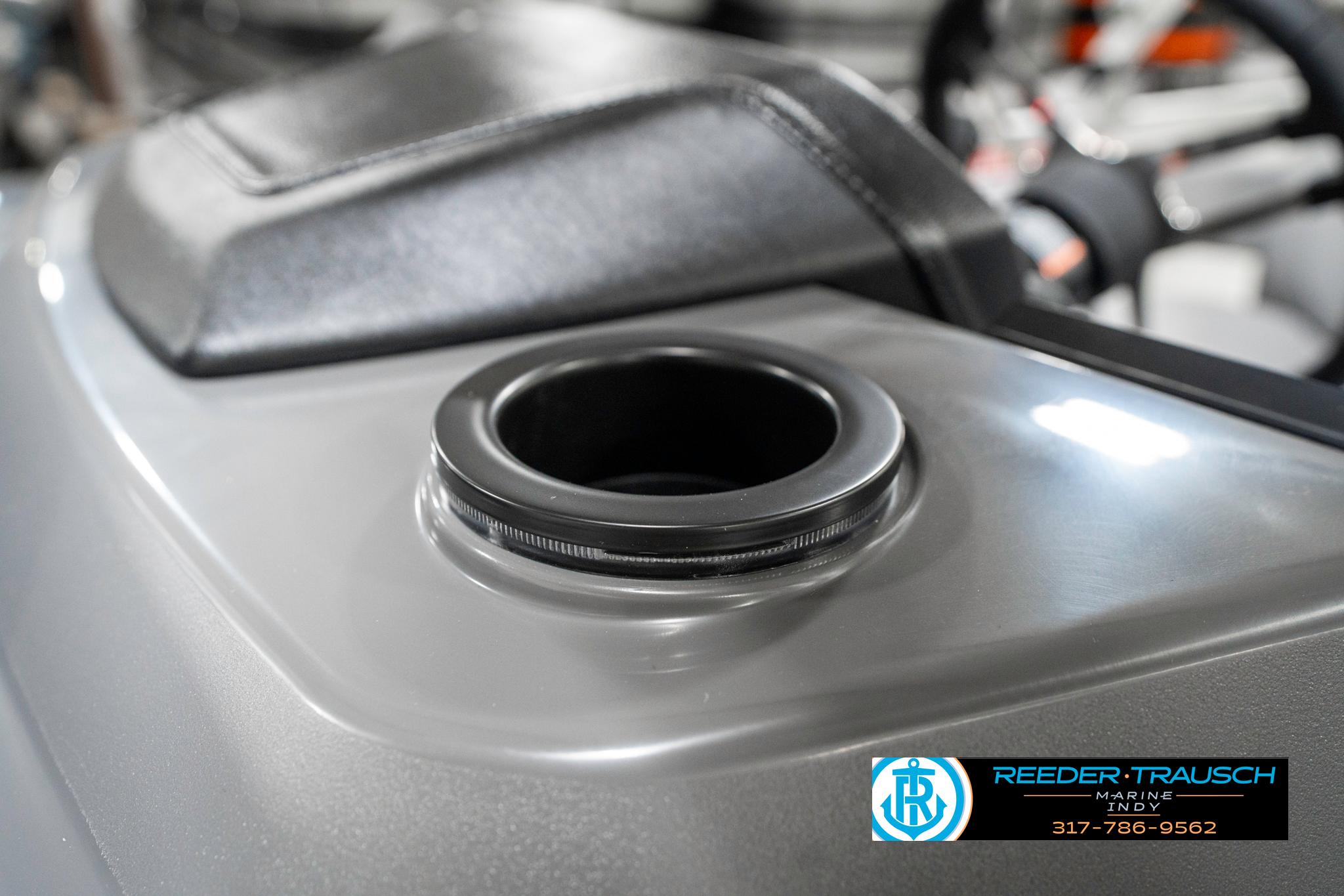 2025 Bennington 22 SLS boat cup holder detail with Reeder-Trausch logo.