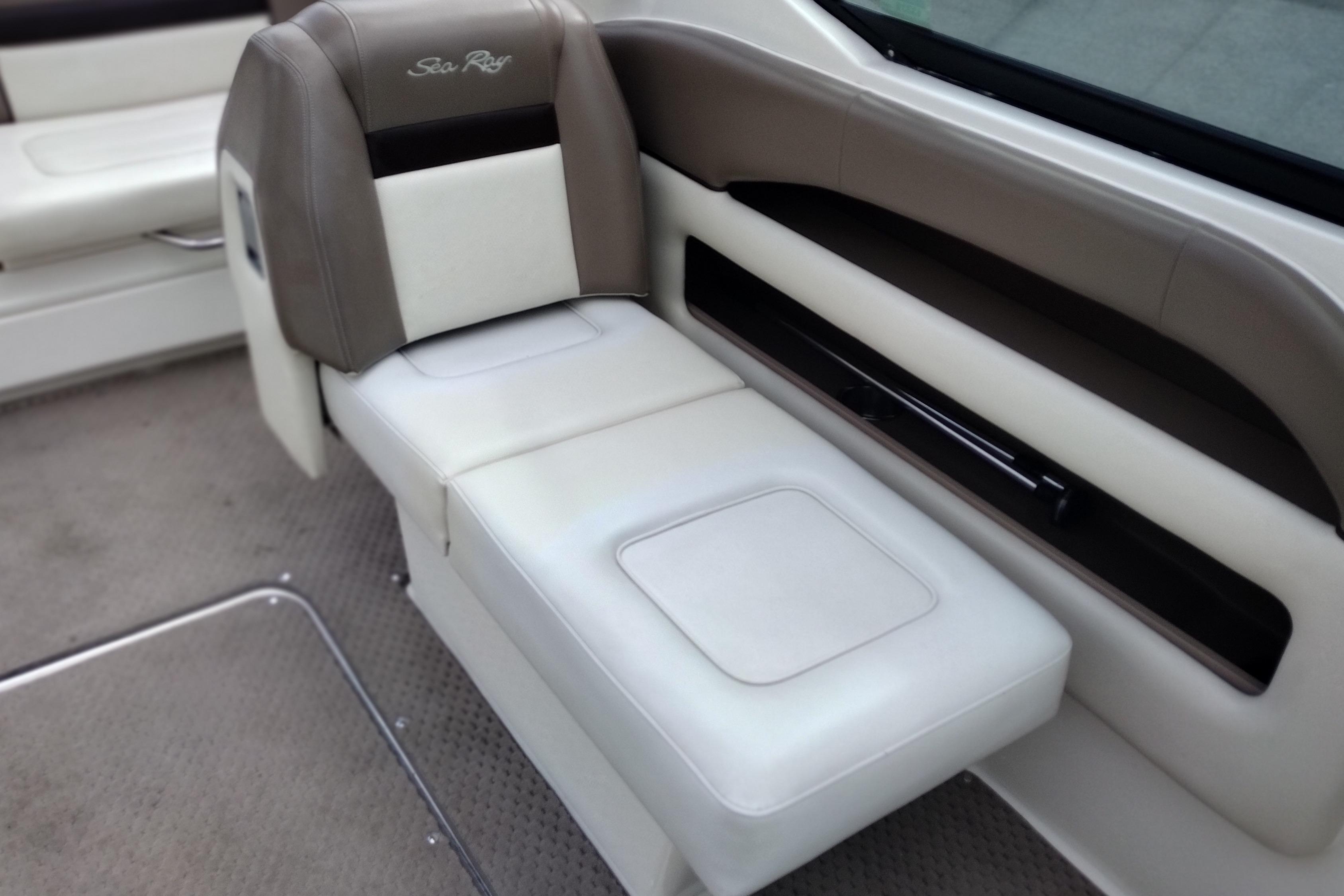 2013 Sea Ray 300 SLX boat interior with beige and brown seating.