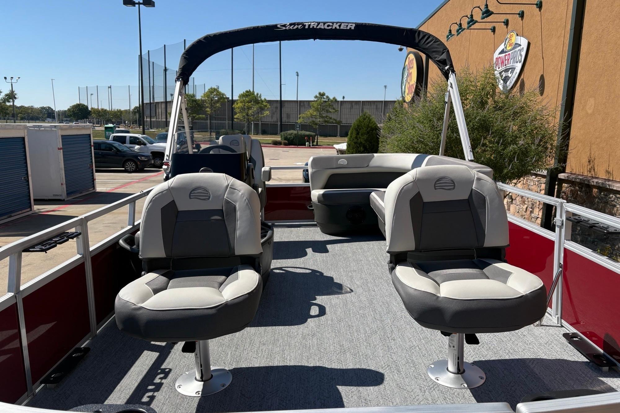 2026 Sun Tracker Bass Buggy 16 XL Select pontoon boat with comfortable seating.