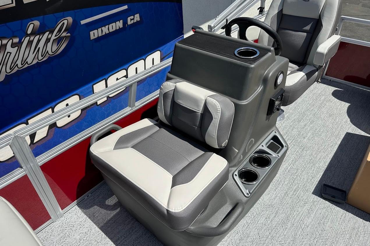 2026 Sun Tracker Bass Buggy 16 XL Select boat interior with seating and steering console.