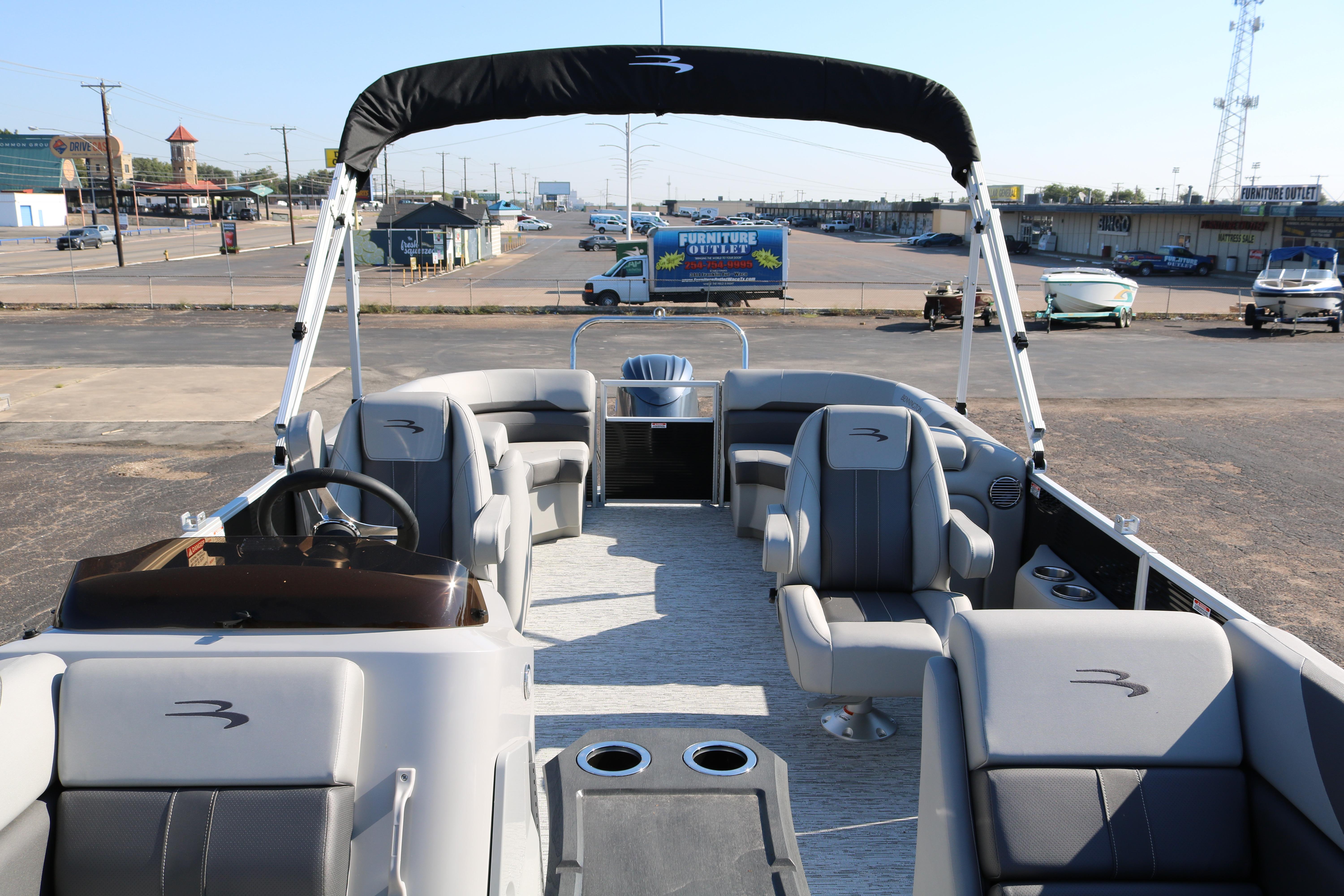 2026 Bennington 22SX Stern Radius pontoon boat with spacious seating and modern design.