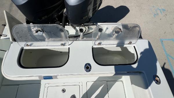 2005 Contender 36 Open boat with dual livewells and twin outboard engines.