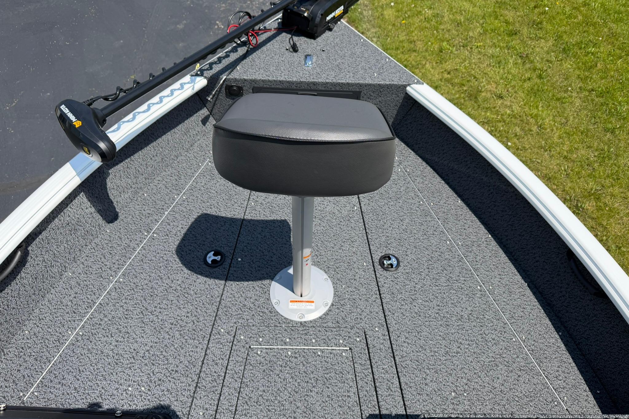 2027 Lund 1675 Adventure Sport boat deck with seat and trolling motor.