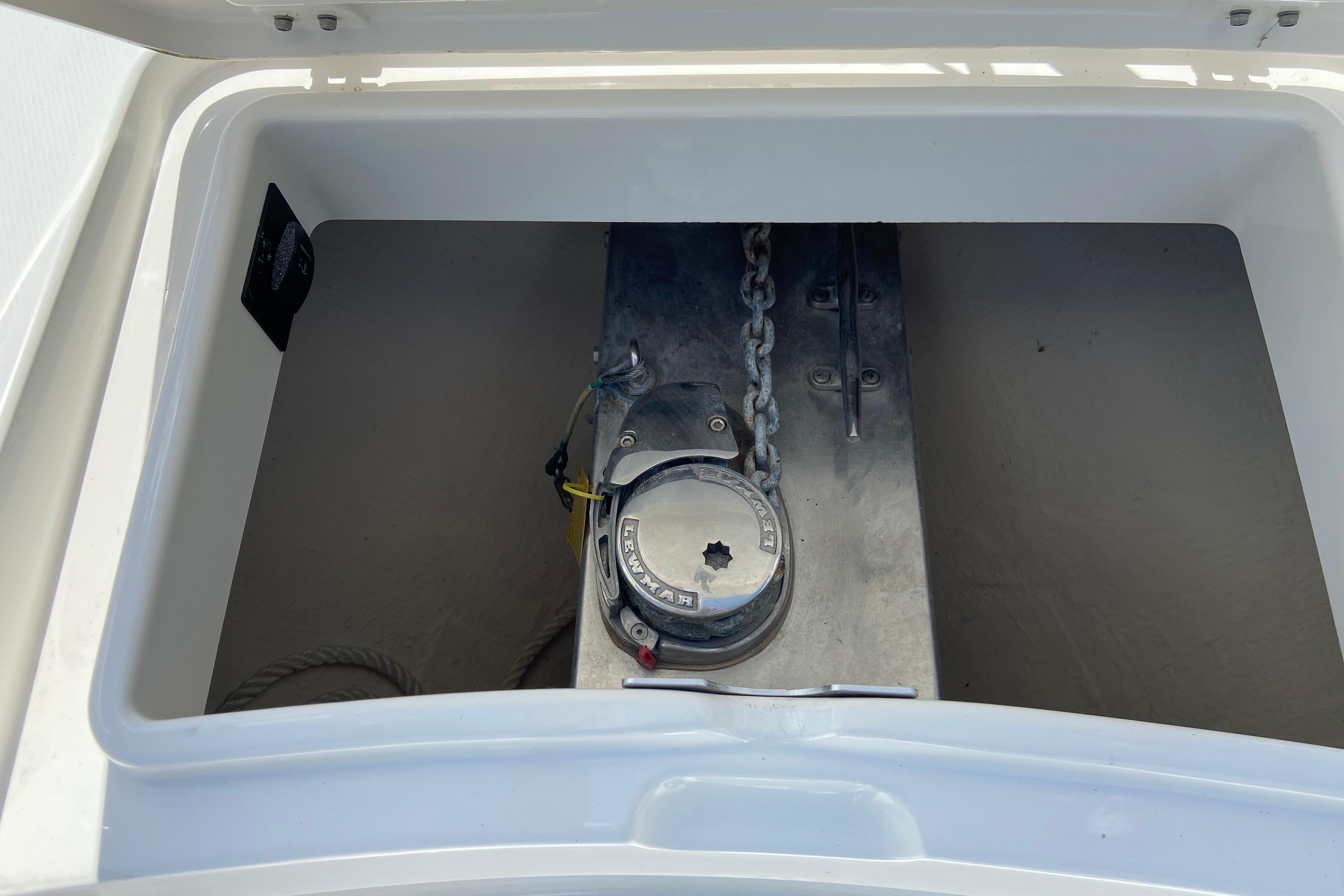 Anchor locker of 2021 Regulator 28 boat with chain and winch.