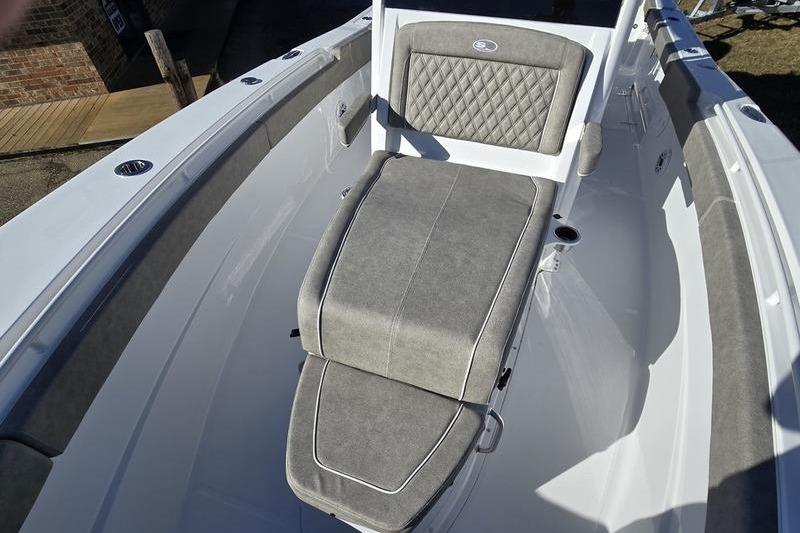 2026 Sea Hunt Ultra 275 Coffin Box boat interior with cushioned seating.