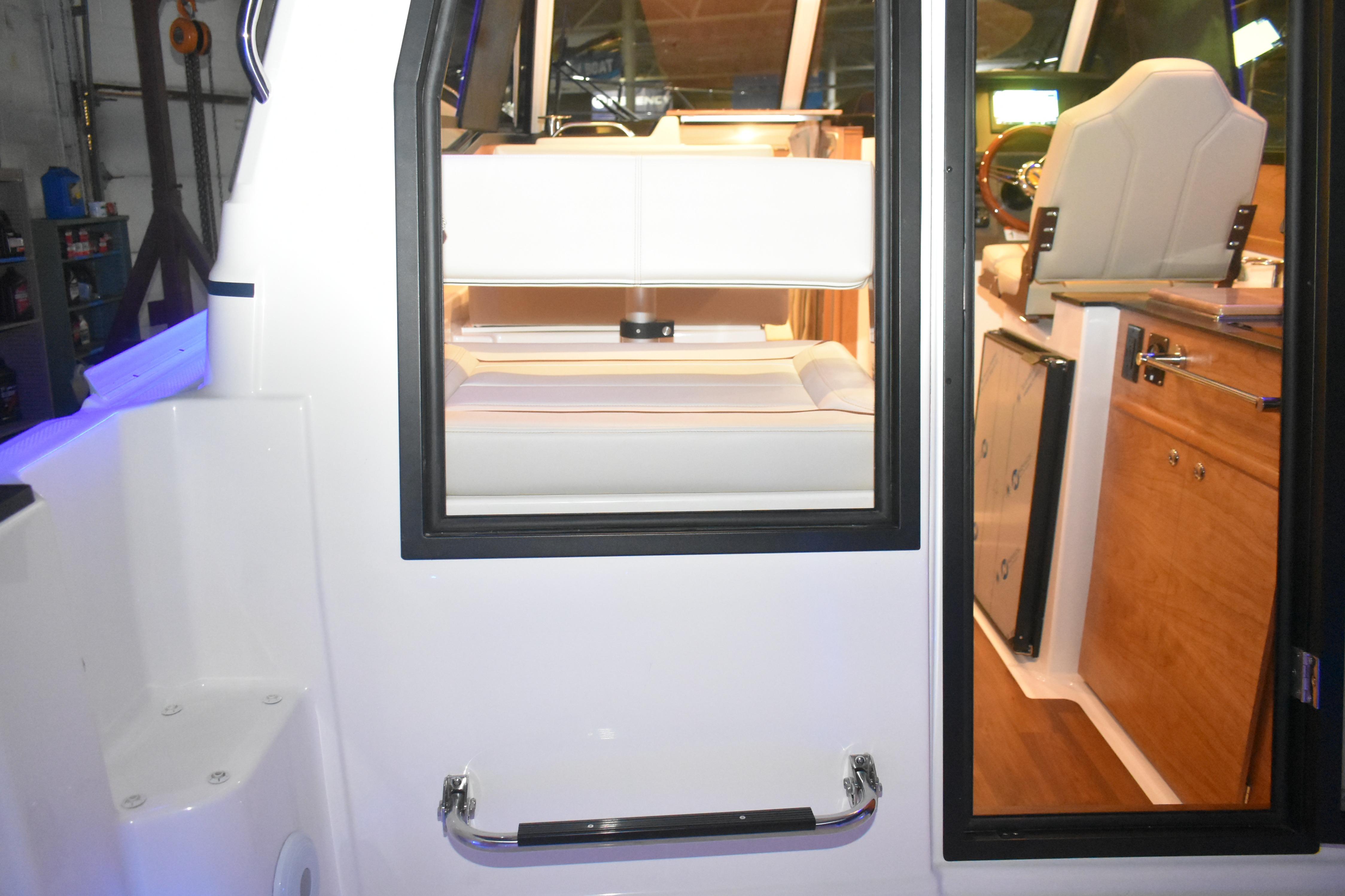 2026 Cutwater C-248 Coupe interior view with seating and helm station.