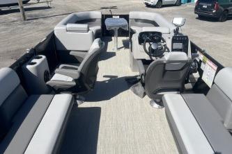 2026 Princecraft Vectra 23 L pontoon boat interior with seating and steering console.