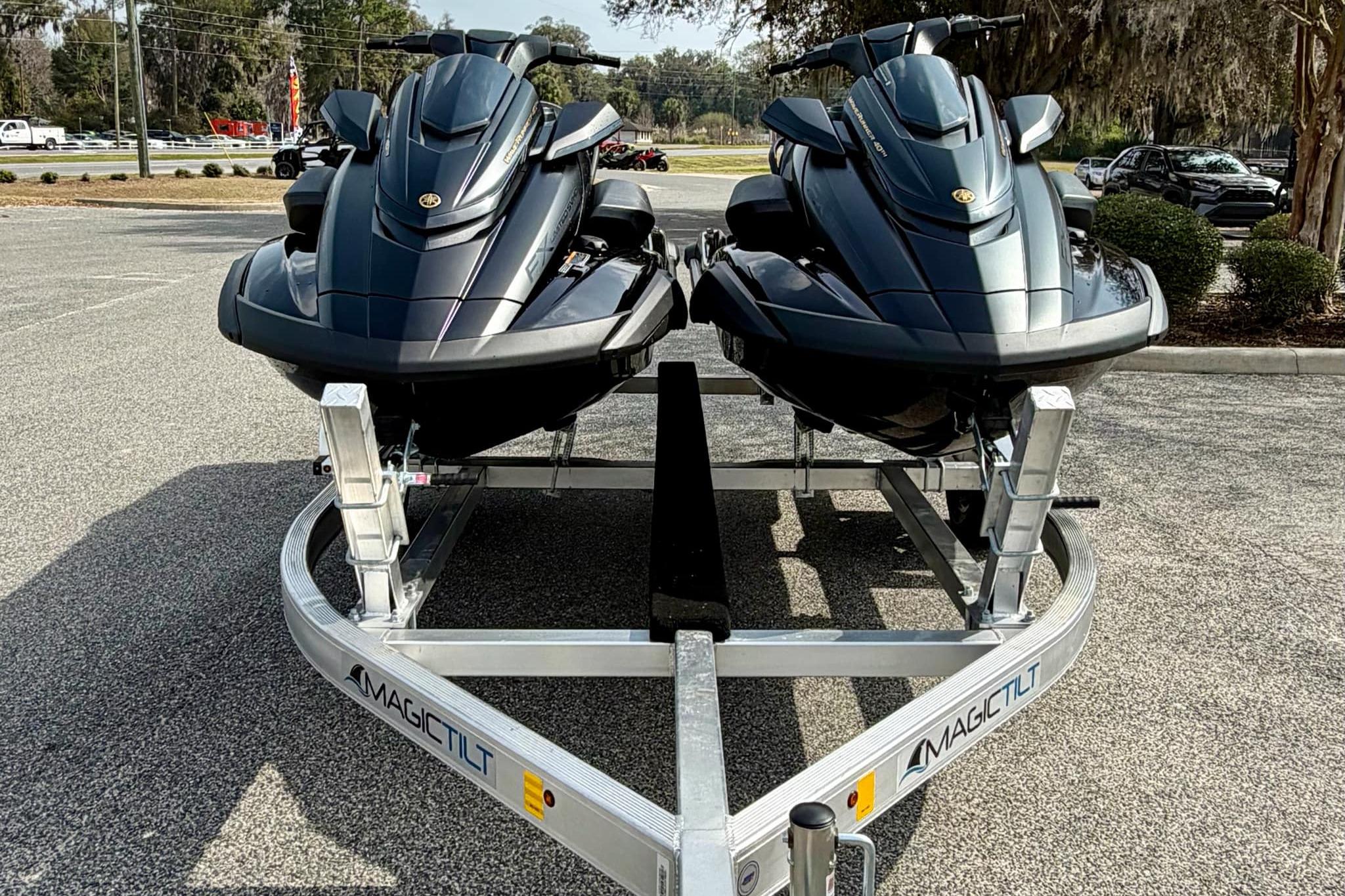 2026 Yamaha WaveRunner FX Limited SVHO jet skis on a trailer in a parking lot.