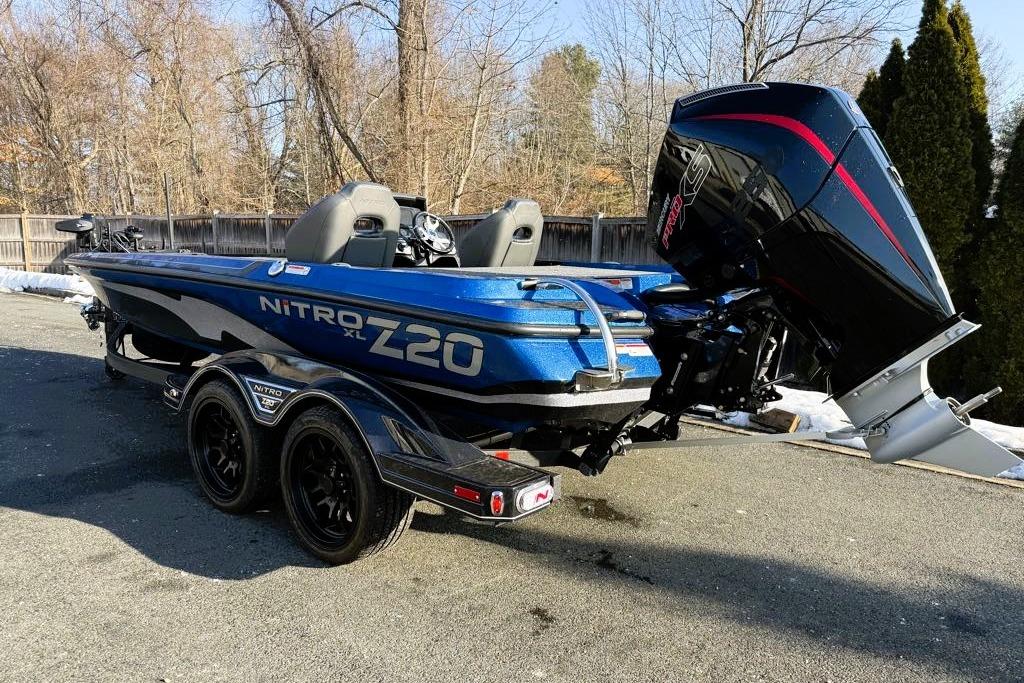 2026 Nitro Z20 XL Pro boat with powerful outboard motor, parked outdoors.