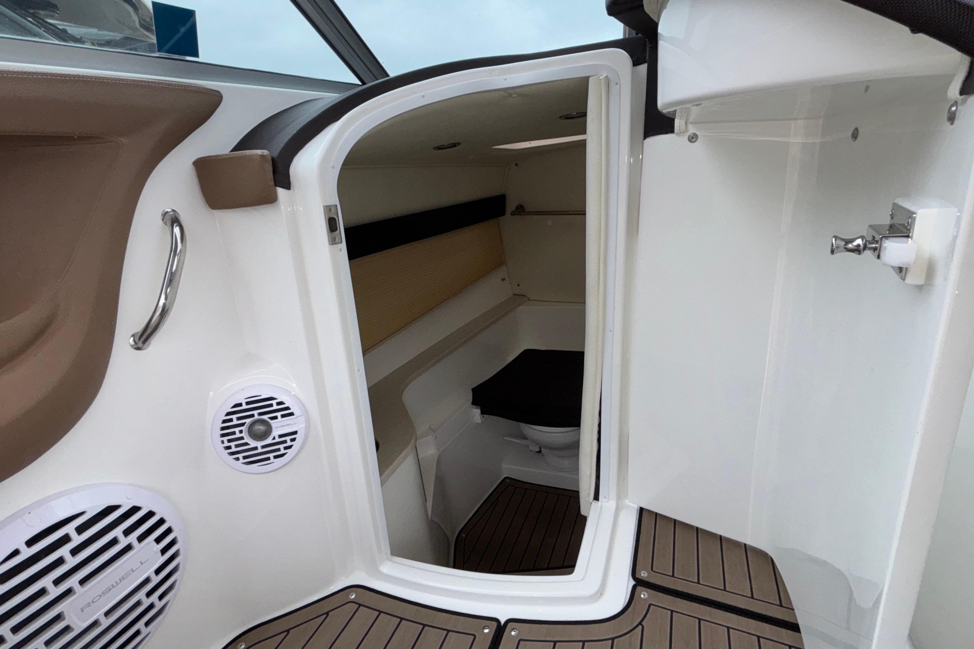 2022 Cobalt R35 boat interior cabin with wood flooring and modern amenities.