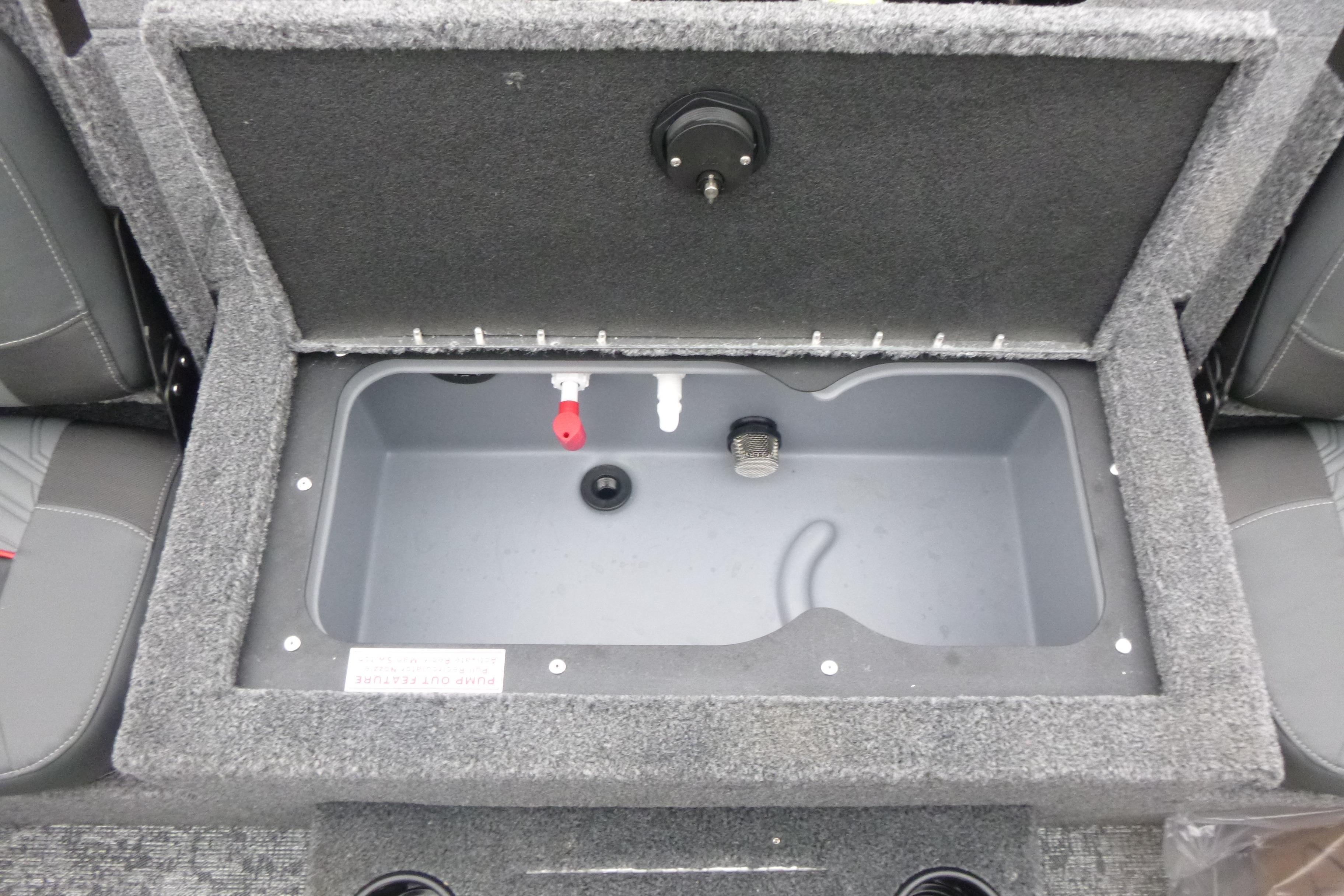 2026 Tracker Targa V-18 Combo boat storage compartment with open lid, gray interior.