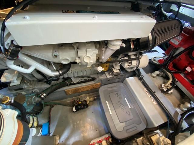 Engine room of 2000 Sea Ray 380 Aft Cabin, showcasing engine and components.