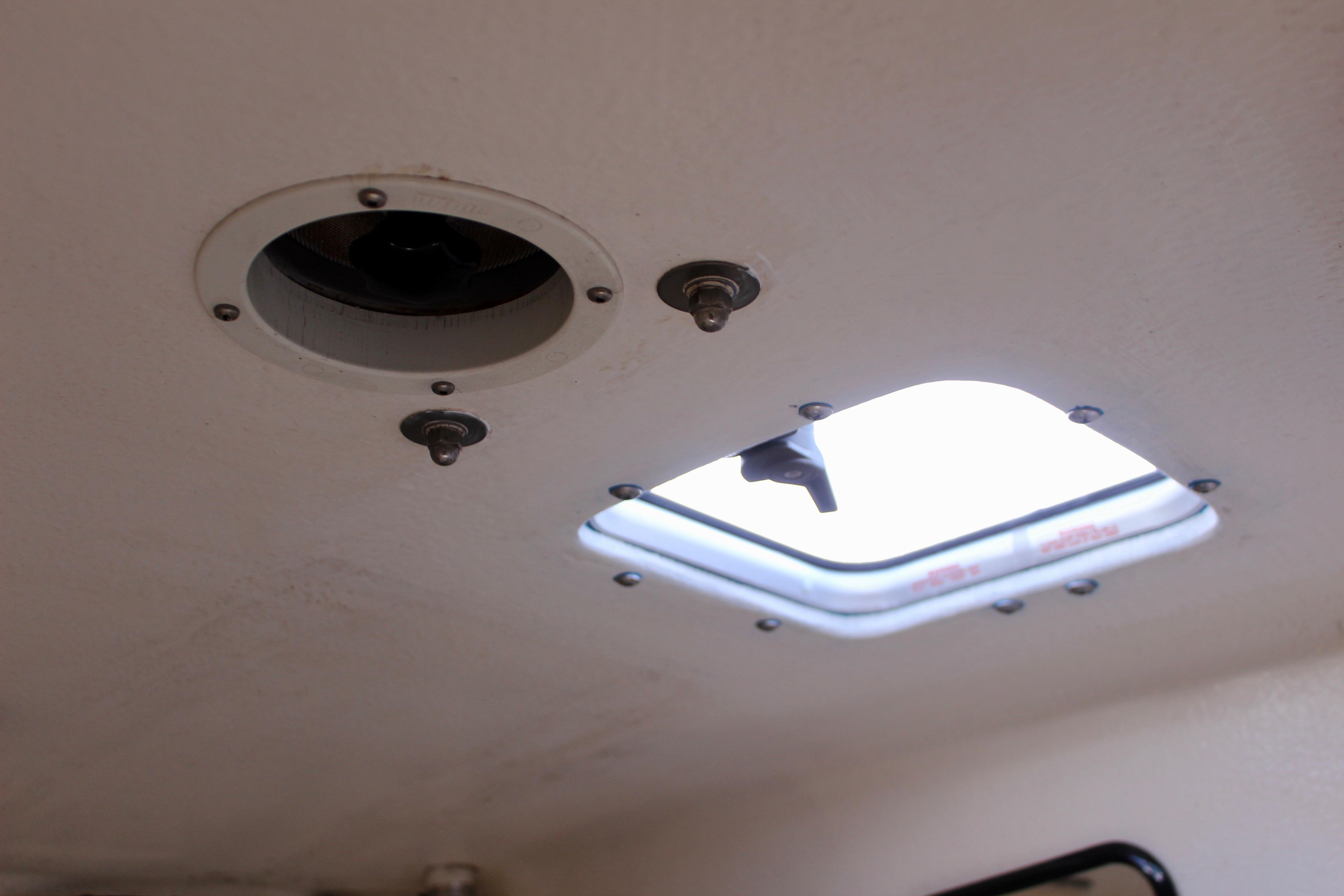 Ceiling view of a 1993 Freya 39 boat with open hatch and fixtures.