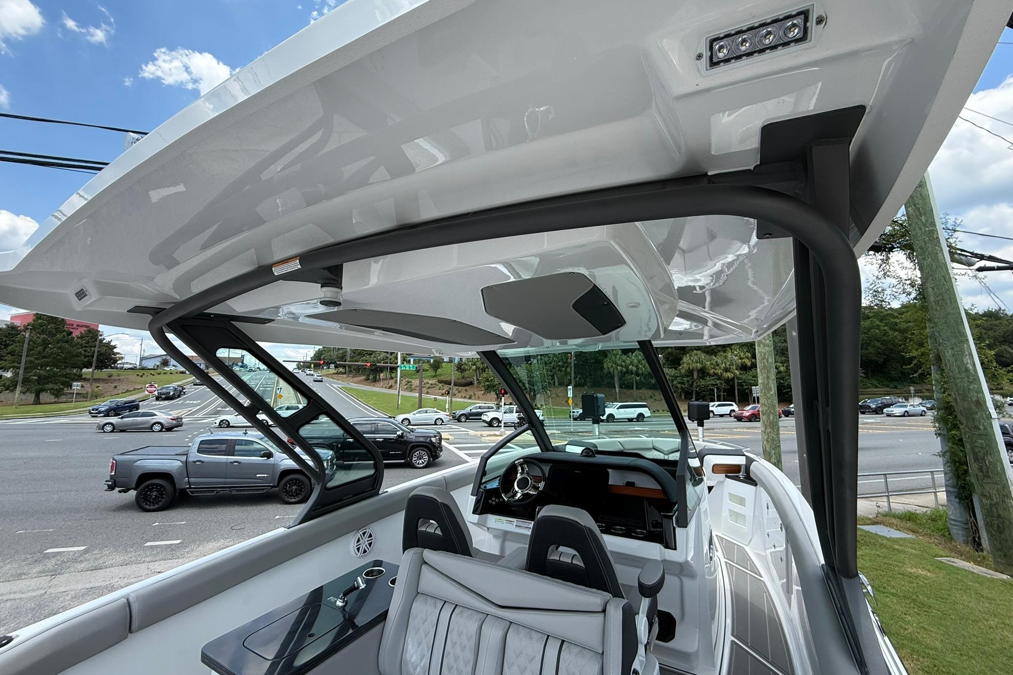 2027 Monterey Elite 30 OB boat interior with sleek design and modern dashboard.