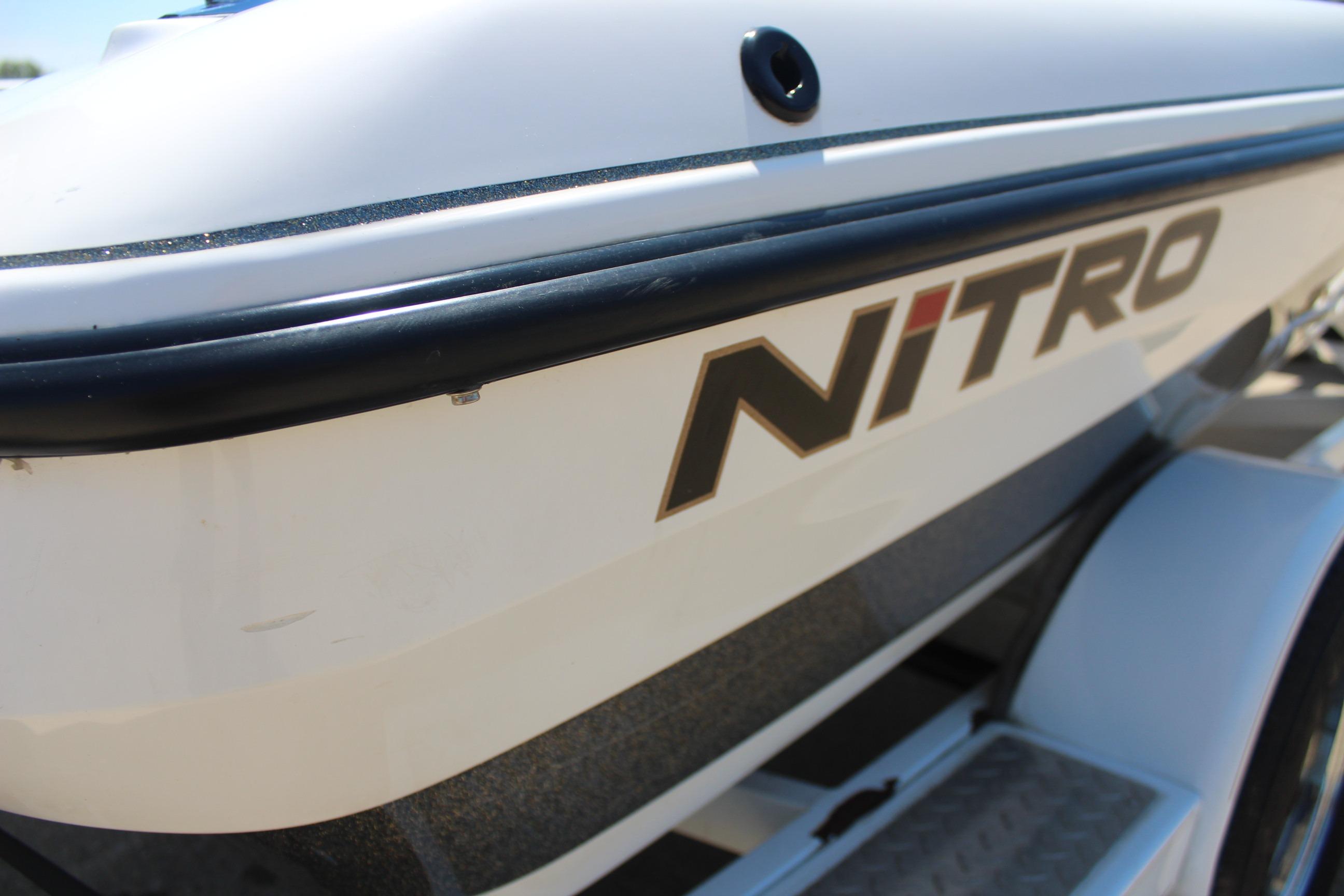 2003 Nitro NX 750 SC boat side view with logo detail.