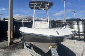 2016 Yamaha Boats 190 FSH Sport on trailer, parked outdoors under clear sky.