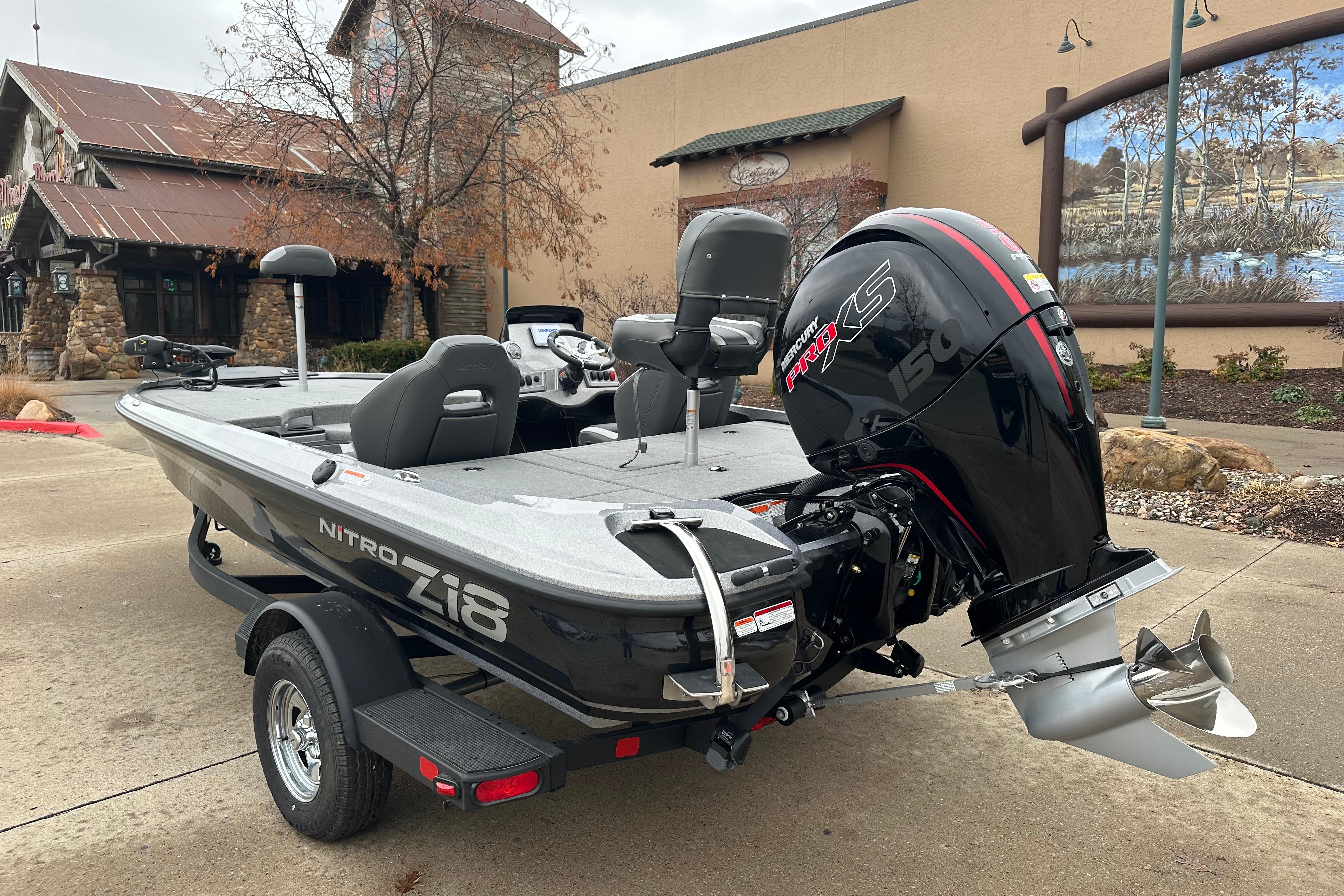 2026 Nitro Z18 boat with Mercury Pro XS engine, parked outdoors.