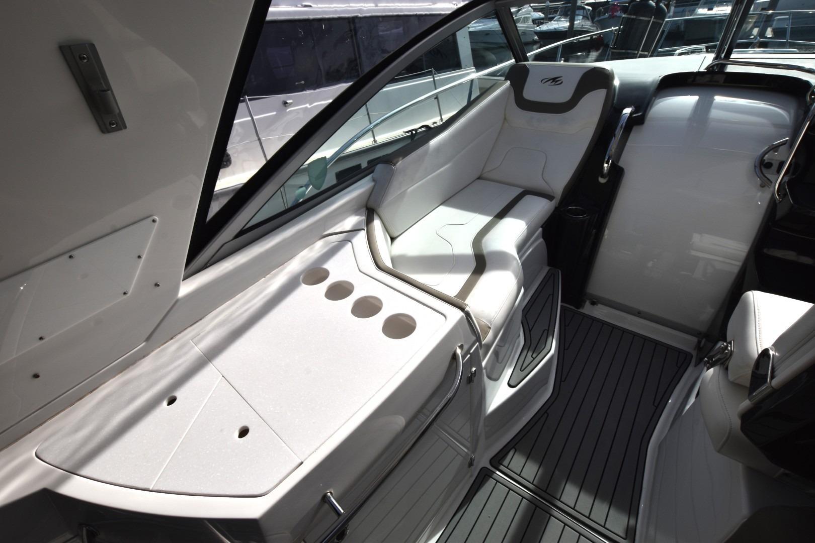 2017 Monterey 355 Sport Yacht interior with sleek seating and modern design.