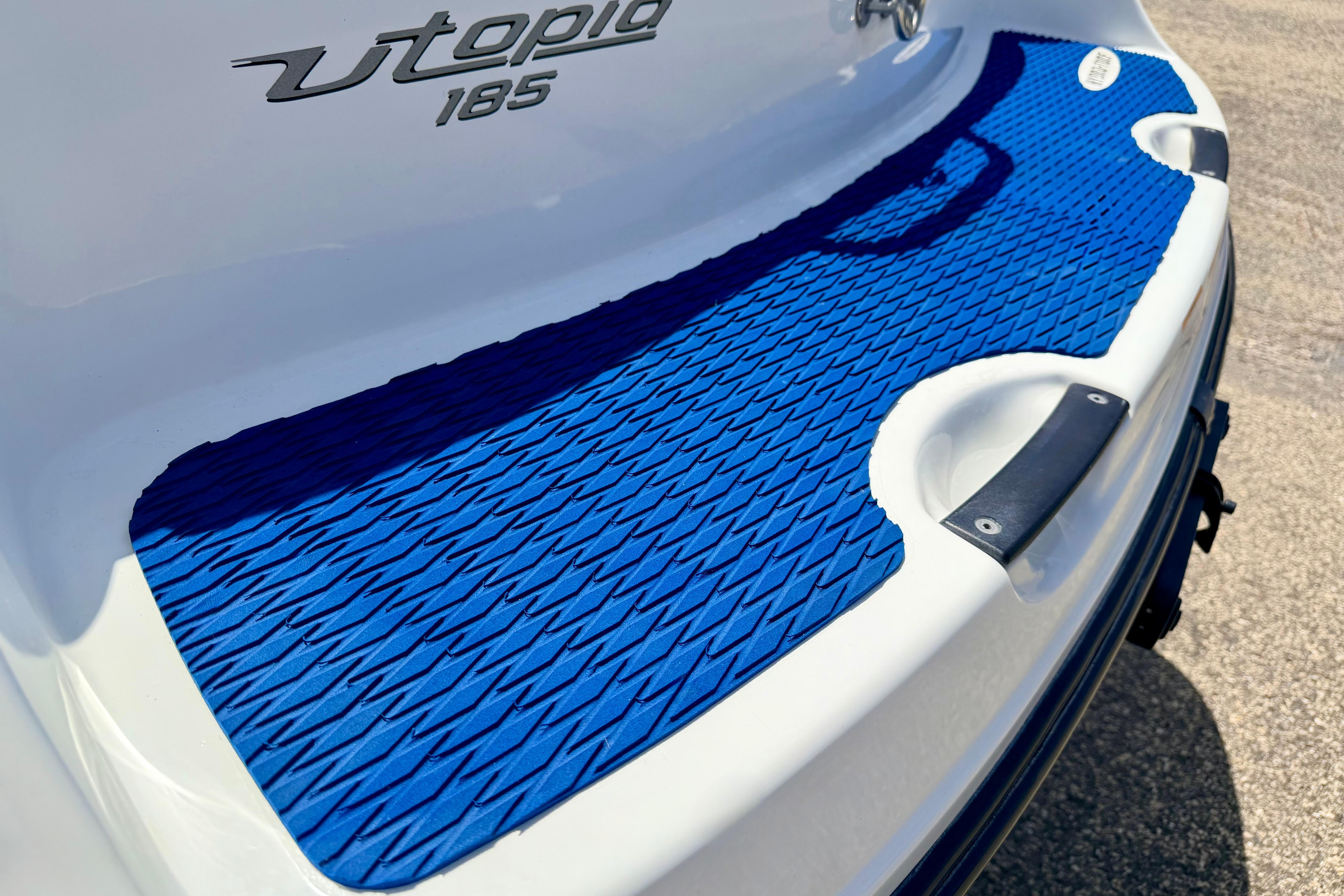2004 Bombardier SEADOO Utopia 185 boat with blue non-slip deck mat.