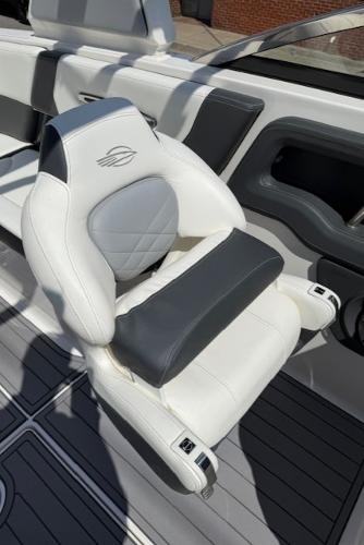 2023 Chaparral 267 SSX boat seat, white and gray leather, modern design.