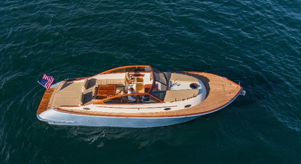 2023 Vento V40 Retro Classic Open boat cruising on the ocean.