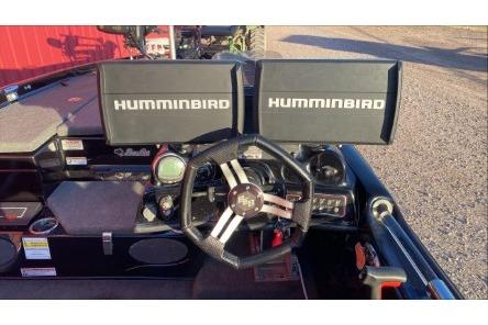 2020 Bass Cat Eyra Premium dashboard with dual Humminbird displays and steering wheel.