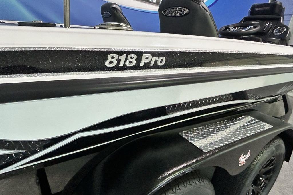 2026 Phoenix 818 Pro boat, sleek design with black and white detailing.