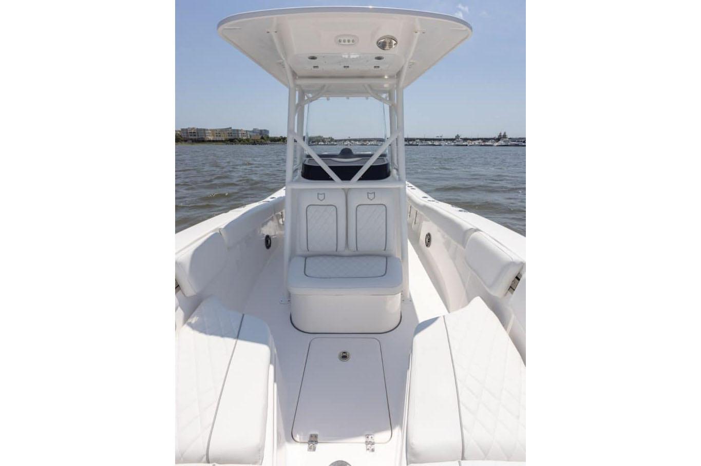 Manufacturer Provided Image: 2025 Sea Fox 228 Commander boat interior with seating and console on open water.
