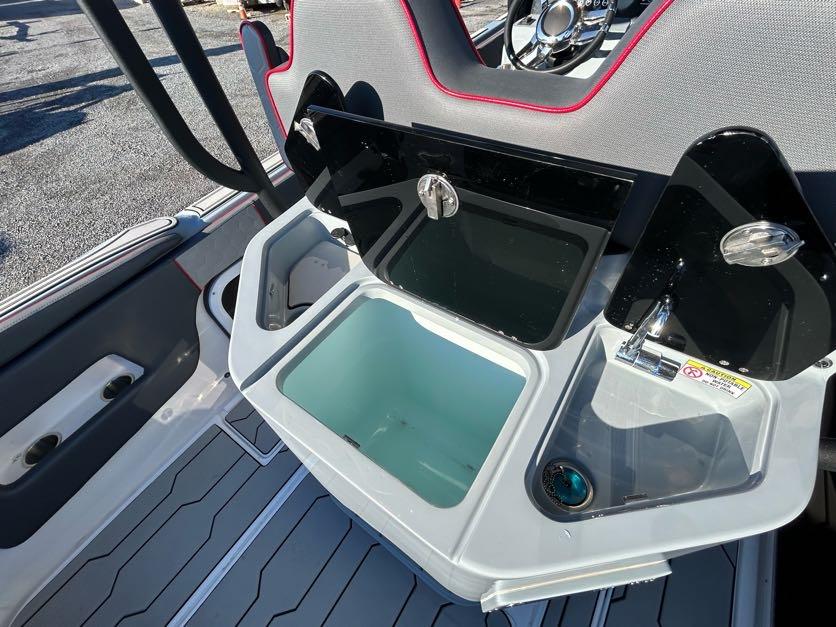2024 Glasstream 32 GSX boat interior with open storage compartment and sleek design.