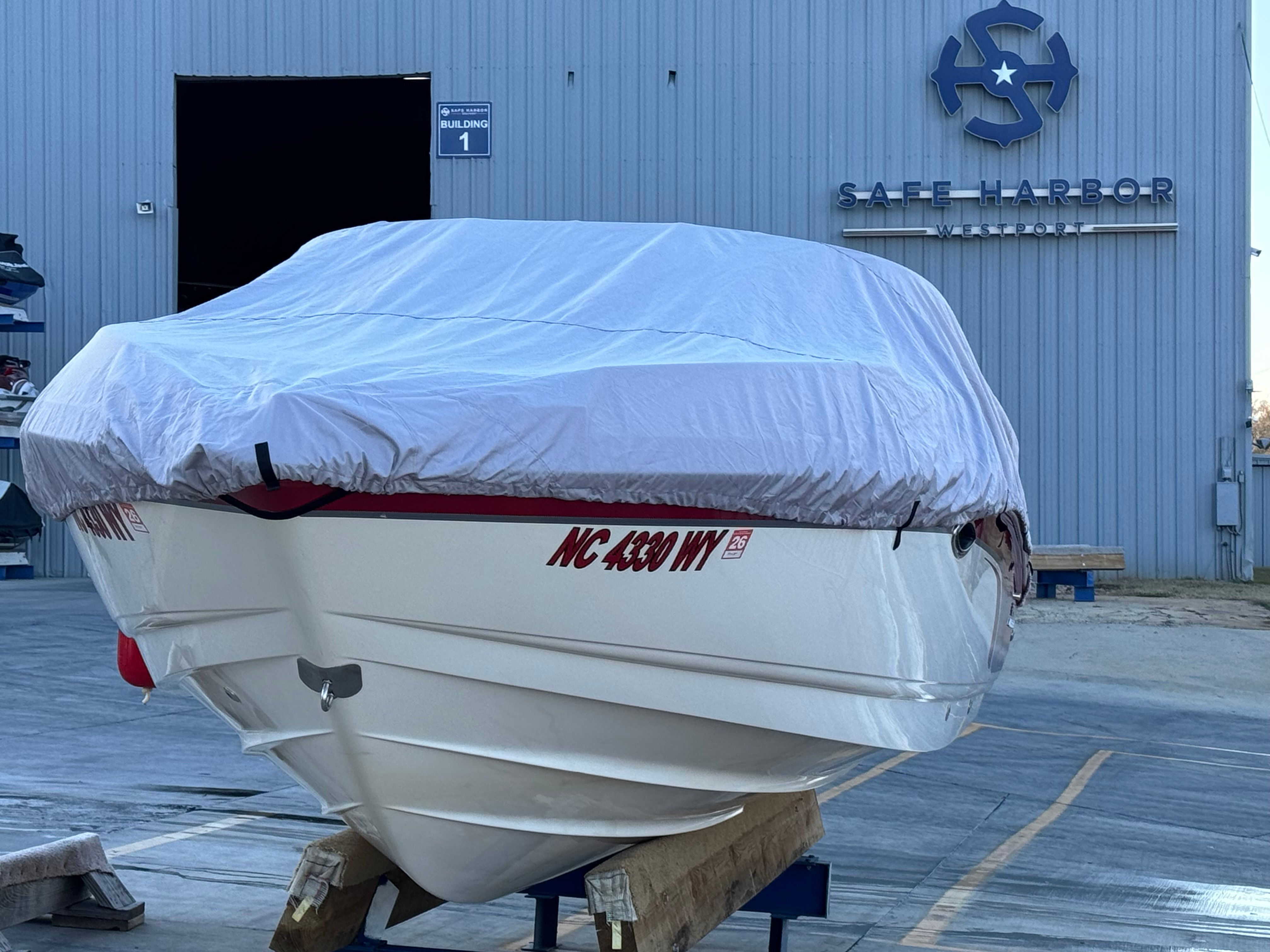 2000 Chaparral 230 SSi boat covered at Safe Harbor Westport.