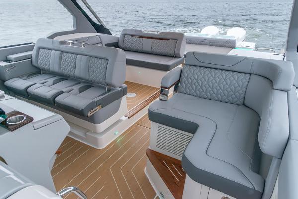 Manufacturer Provided Image: Luxurious interior of 2026 Regal LX43 boat with elegant seating and ocean view.