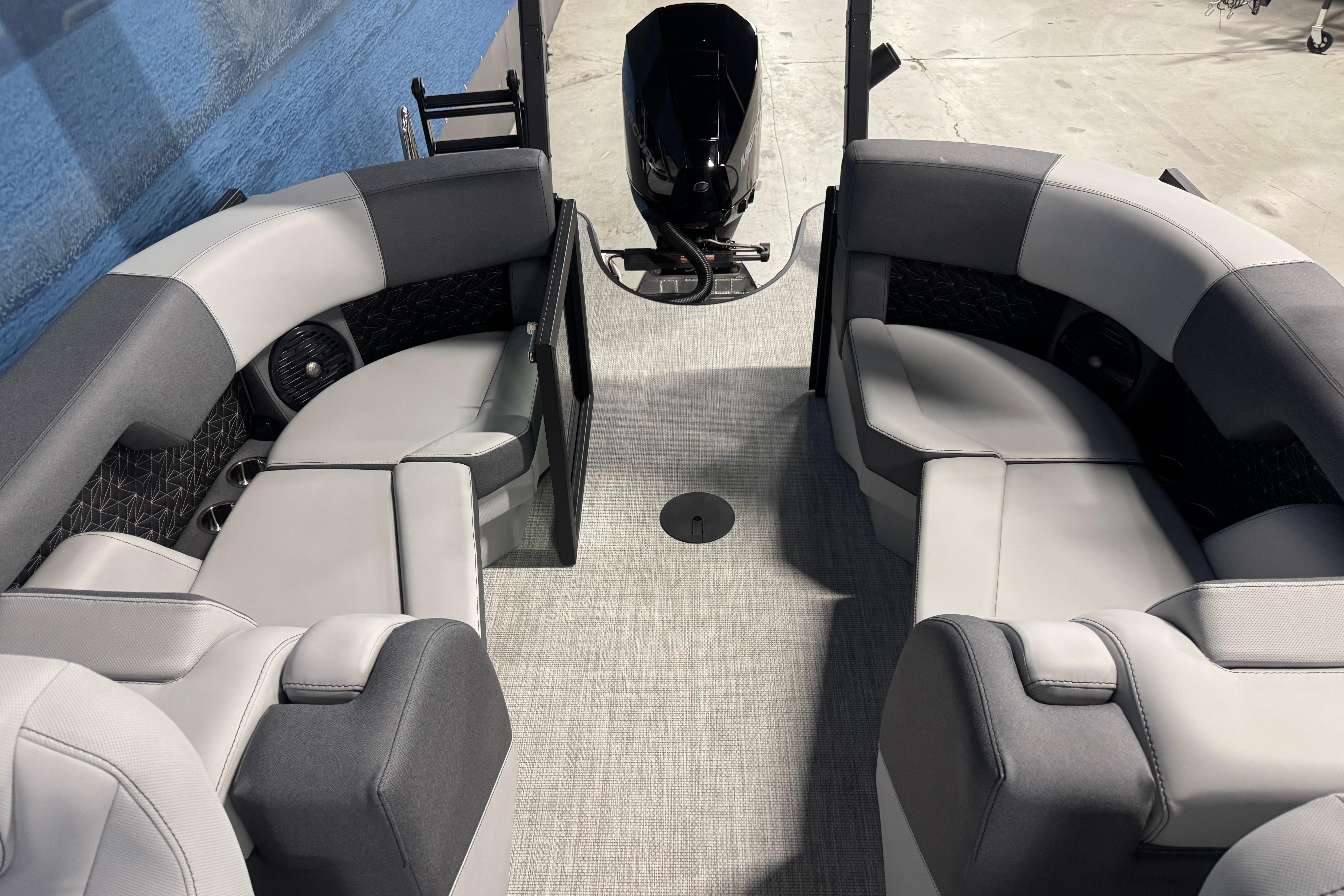 Interior of 2026 Alera M21Q boat with gray seating and modern design.