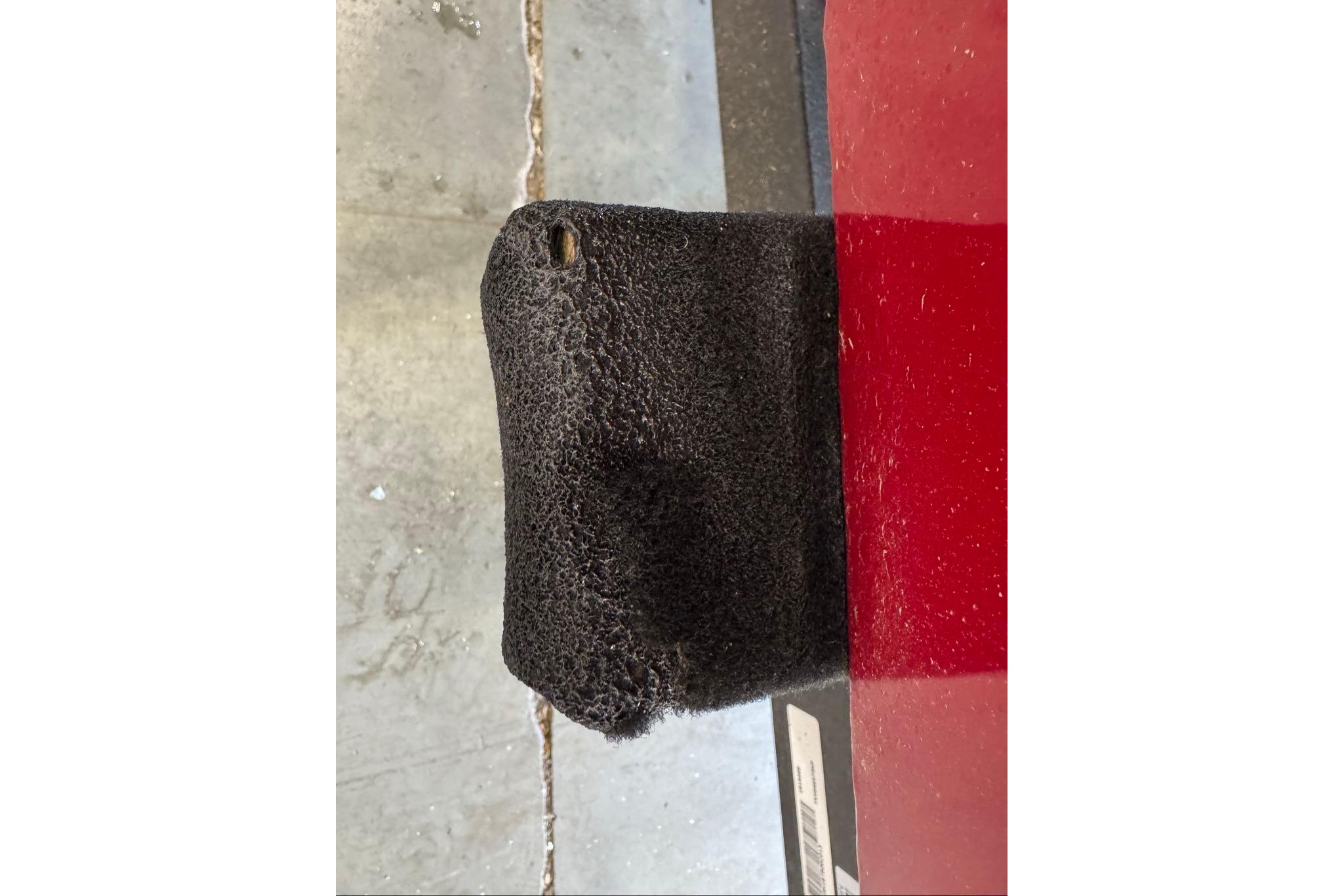 Close-up of a black textured component on a 2026 Tracker Bass Tracker Classic XL boat.