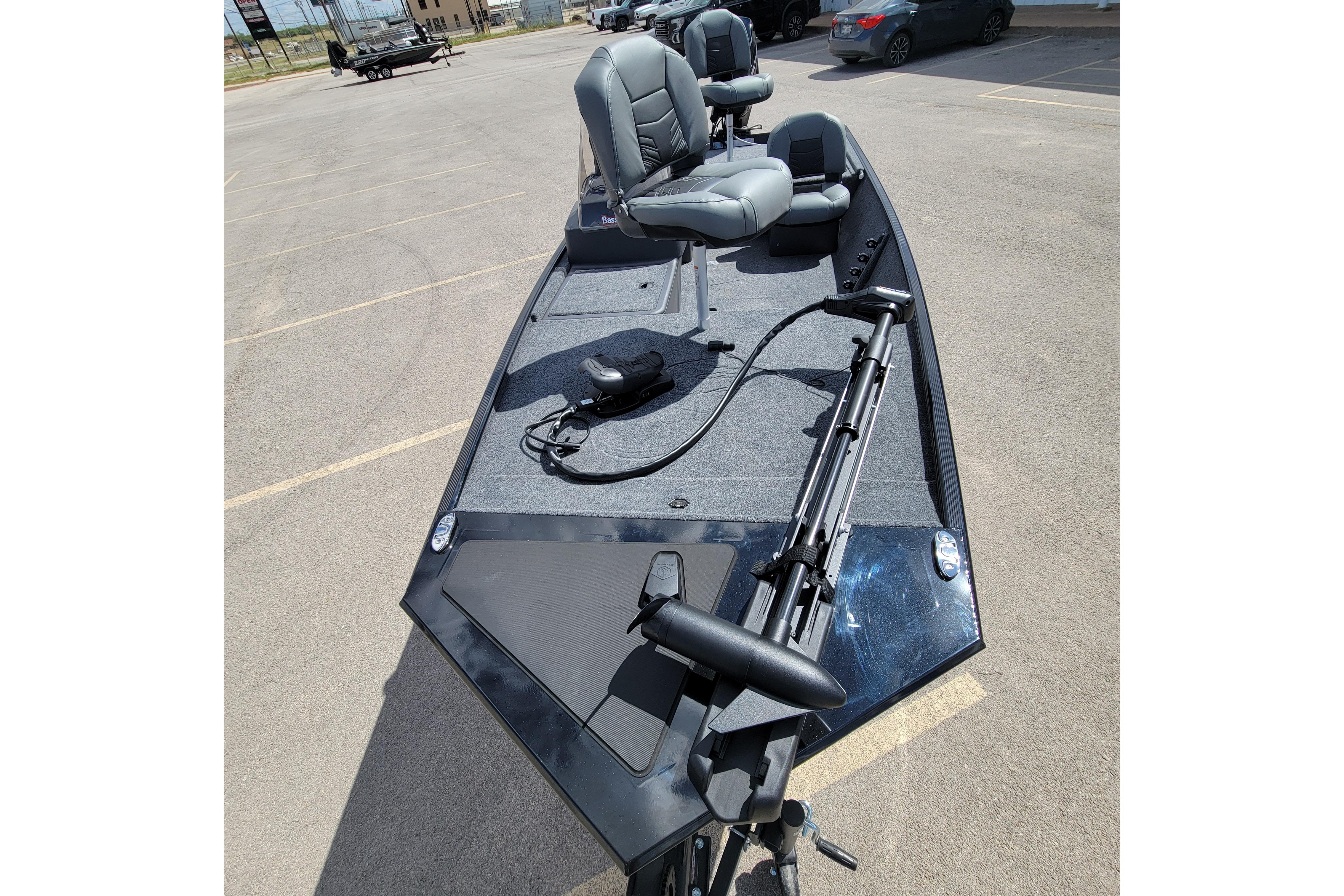 2026 Tracker Bass Tracker Classic XL boat with seating and fishing equipment.