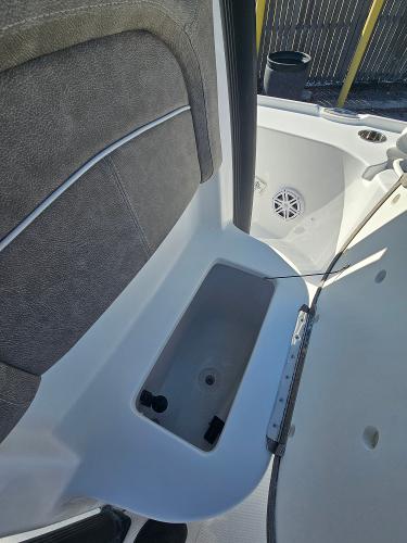 2026 Sea Hunt BX 22 BR boat interior with storage compartment and seating.