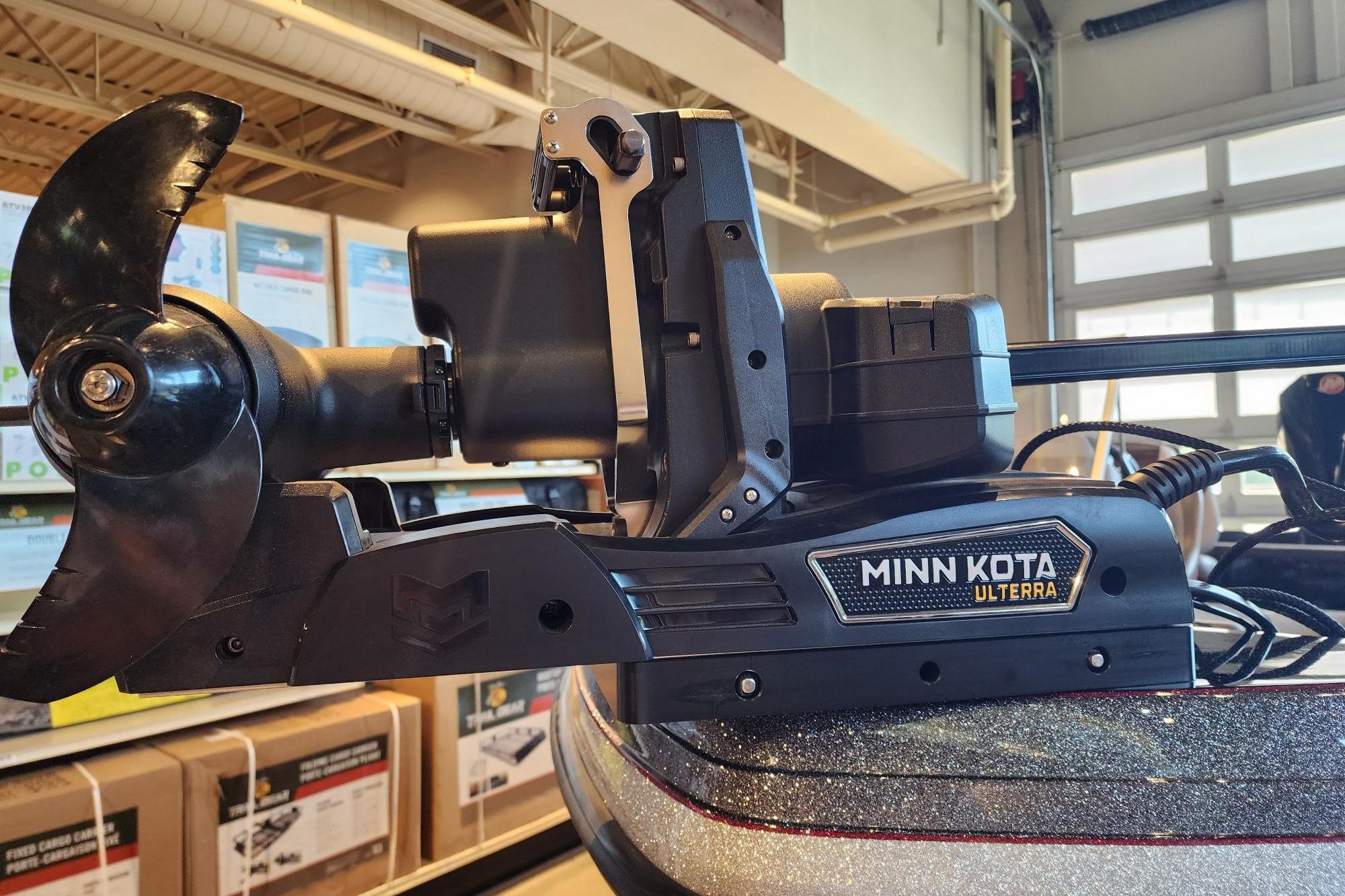 Minn Kota Ulterra motor on 2025 Ranger 1880MS boat in a showroom setting.