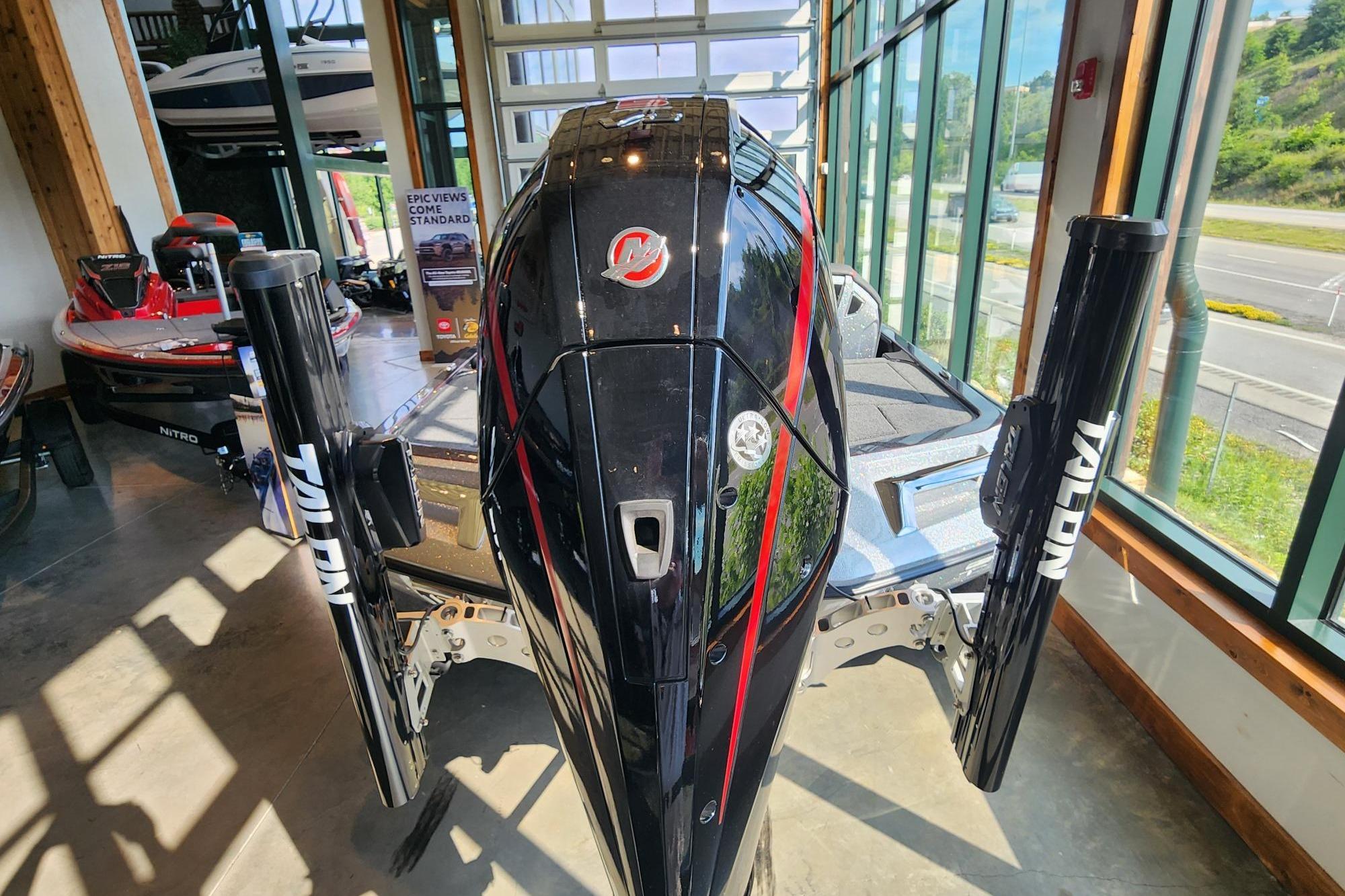 2026 Ranger Z519R boat with Talon anchors displayed in a showroom.