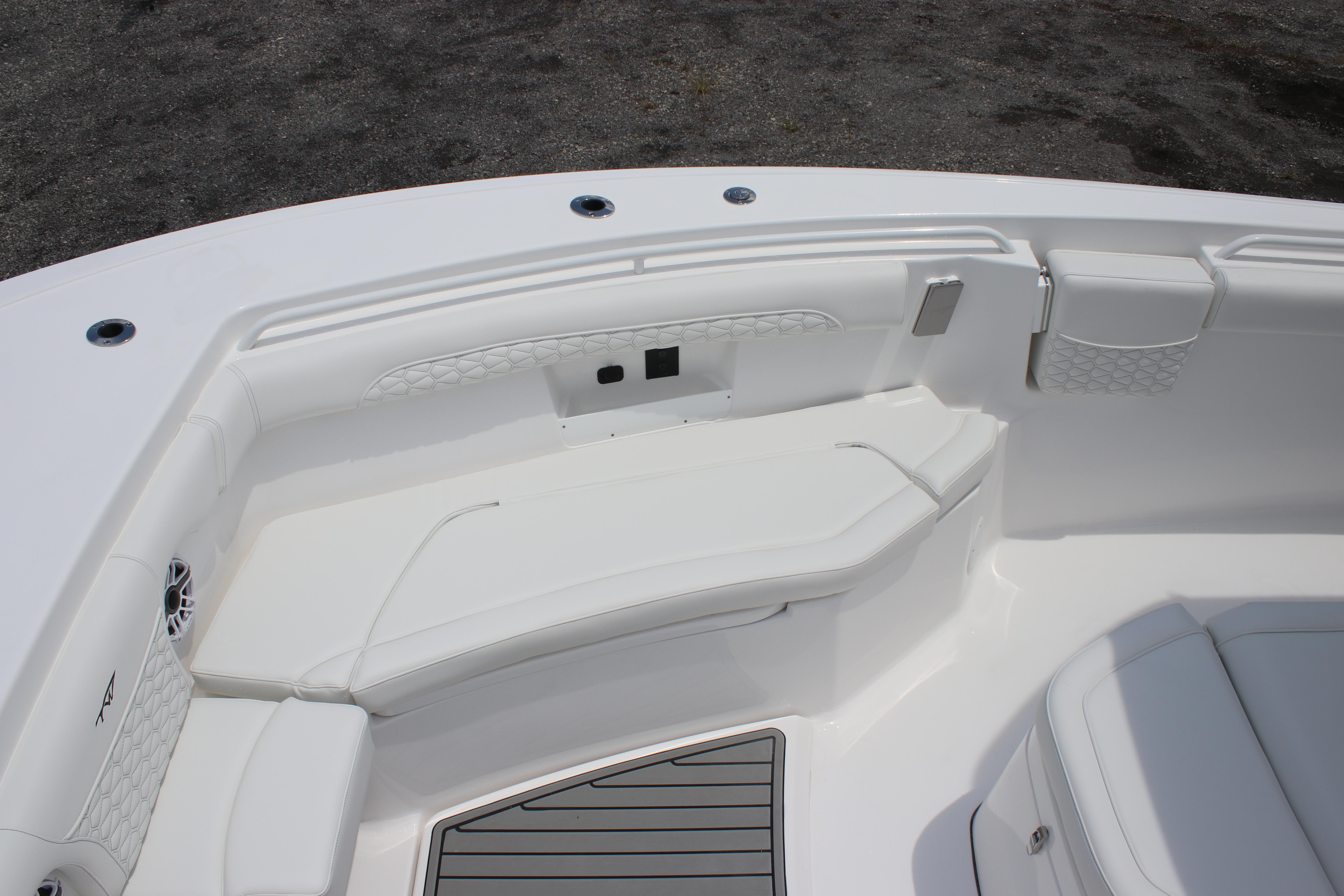 2026 Tidewater 272 LXF boat interior with white seating and modern design.