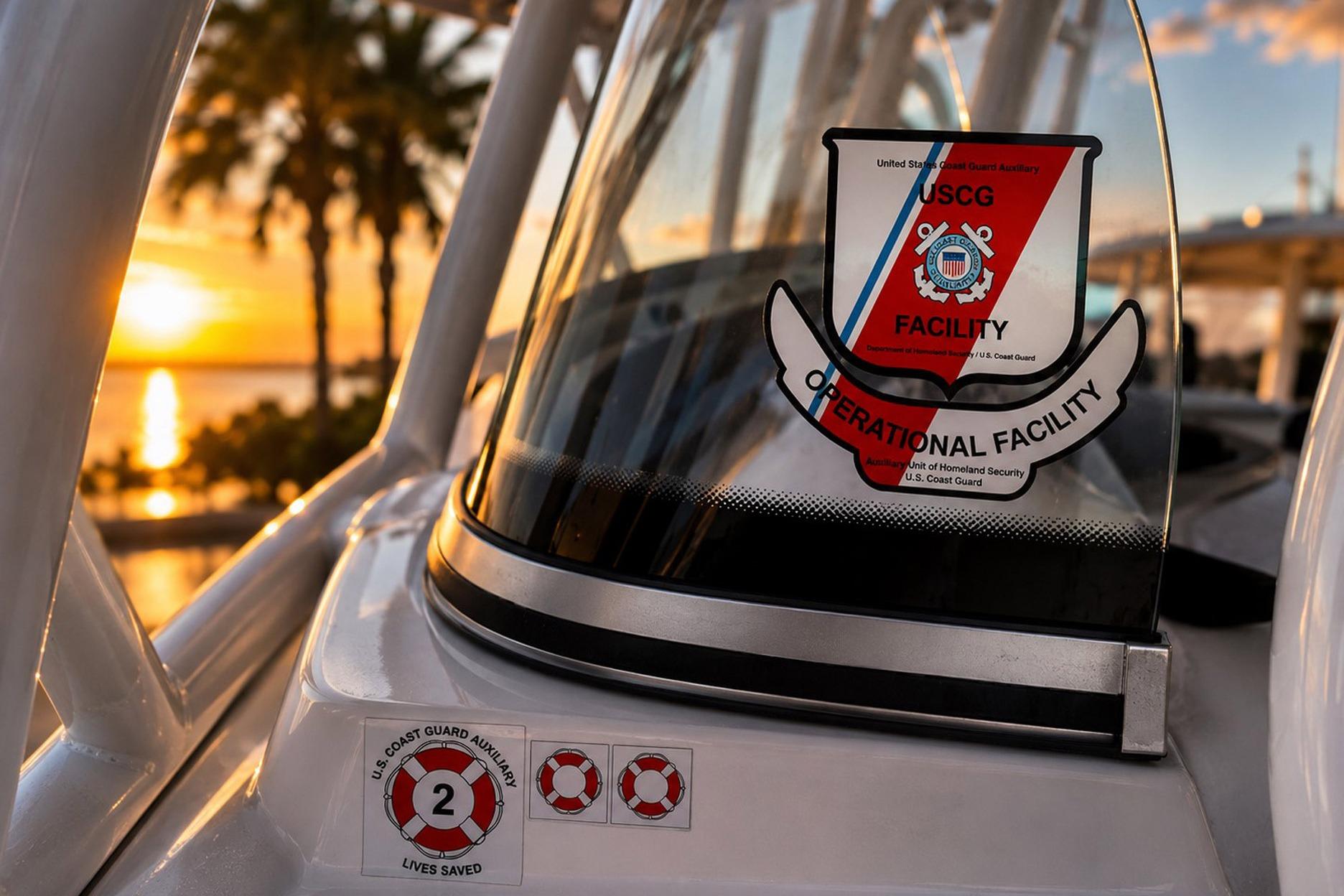 Boat with USCG Operational Facility sticker at sunset, Sea Fox 228 Commander, 2002 model.