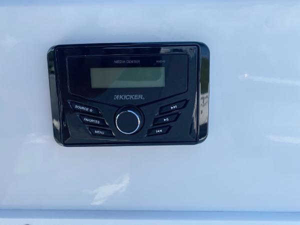 2024 Tahoe 2150 media center with Kicker audio system.