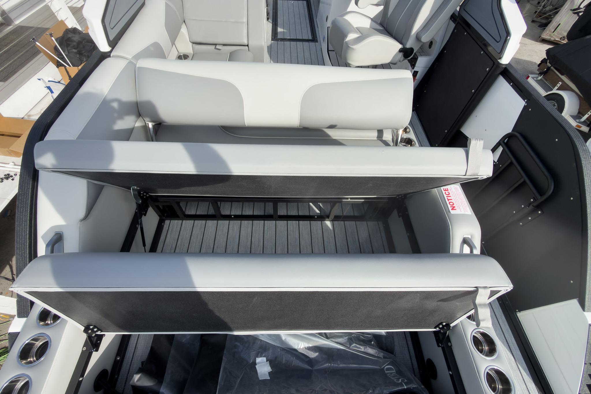 2026 Montara Surf Boss 2.0 SL 23" boat interior with adjustable seating and cup holders.