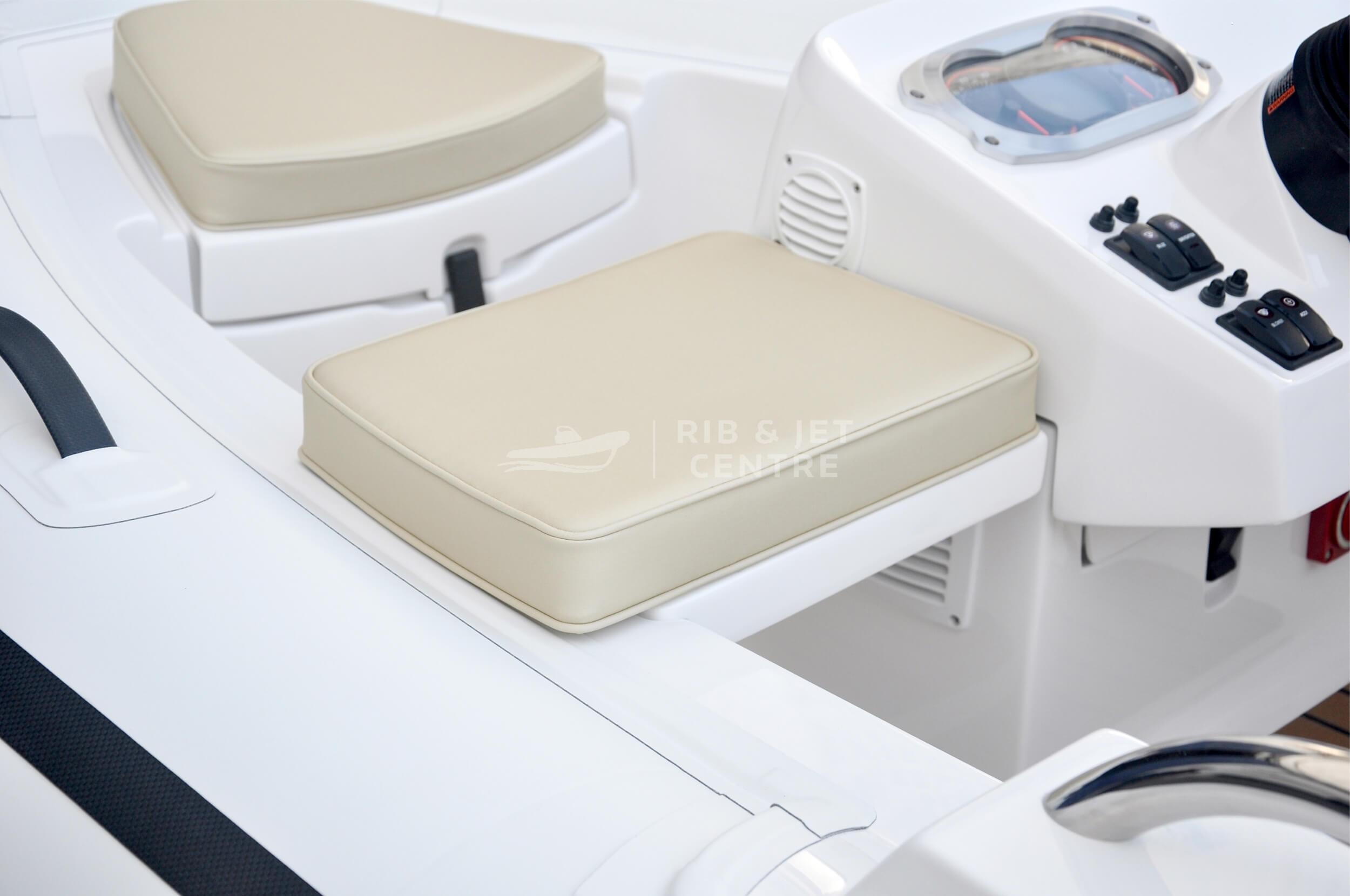 2023 AB Inflatables ABJET 350XP boat interior with beige seating and control panel.