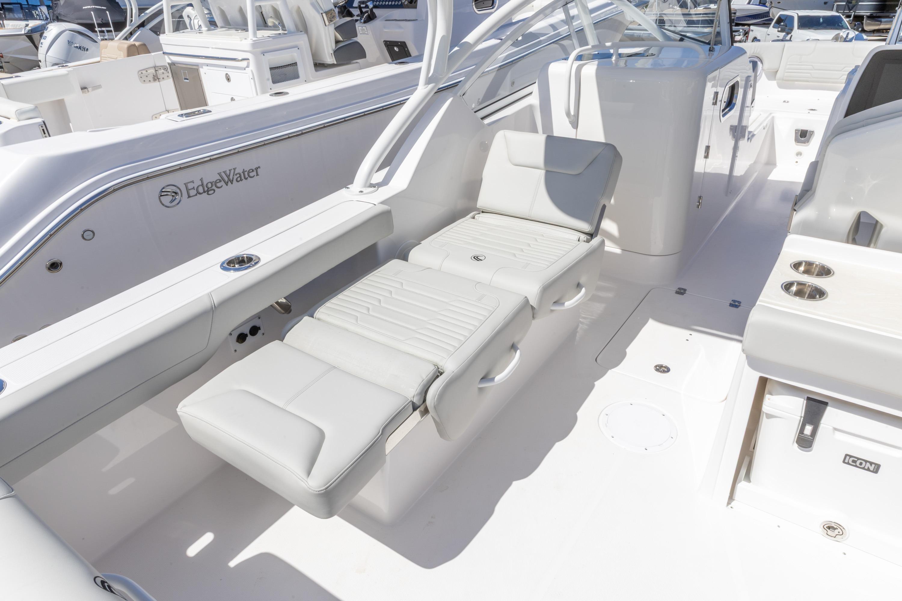 2026 Edgewater 248CX Crossover boat interior with luxurious seating and modern design.